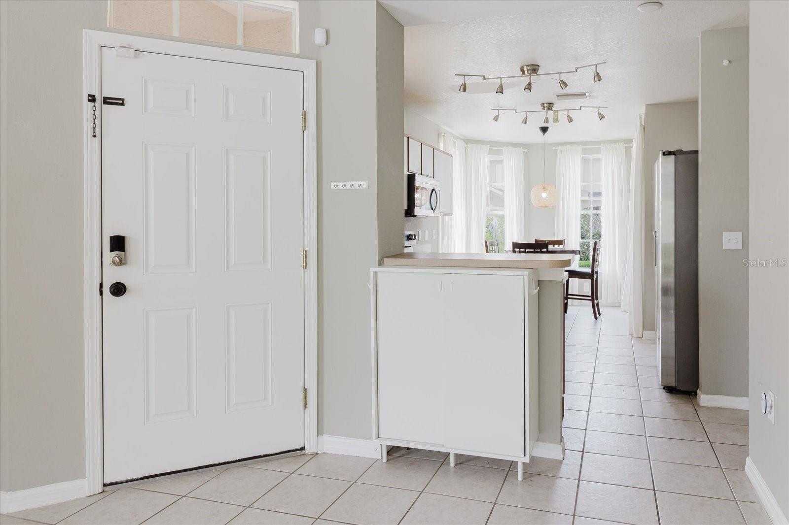 Foyer With Tile Floors