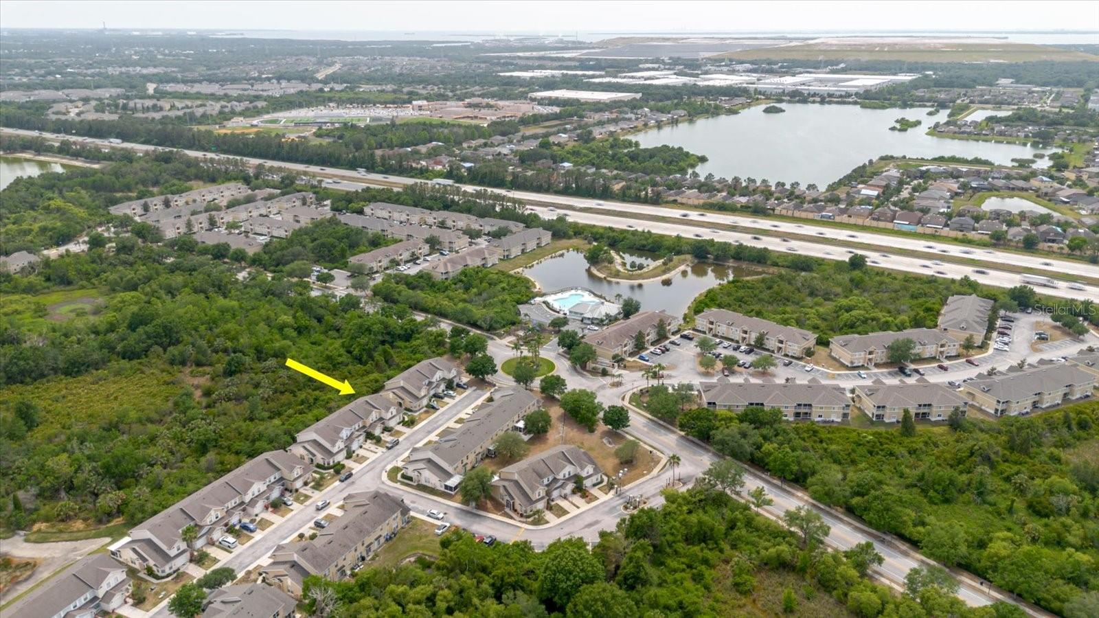 There Is a Walking Path To The Community Amenities From The Townhome