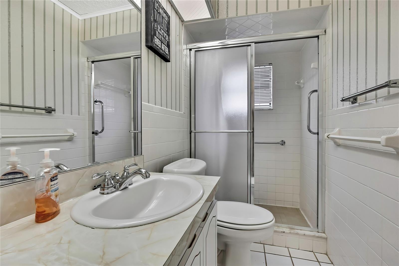 walk-in shower off kitchen