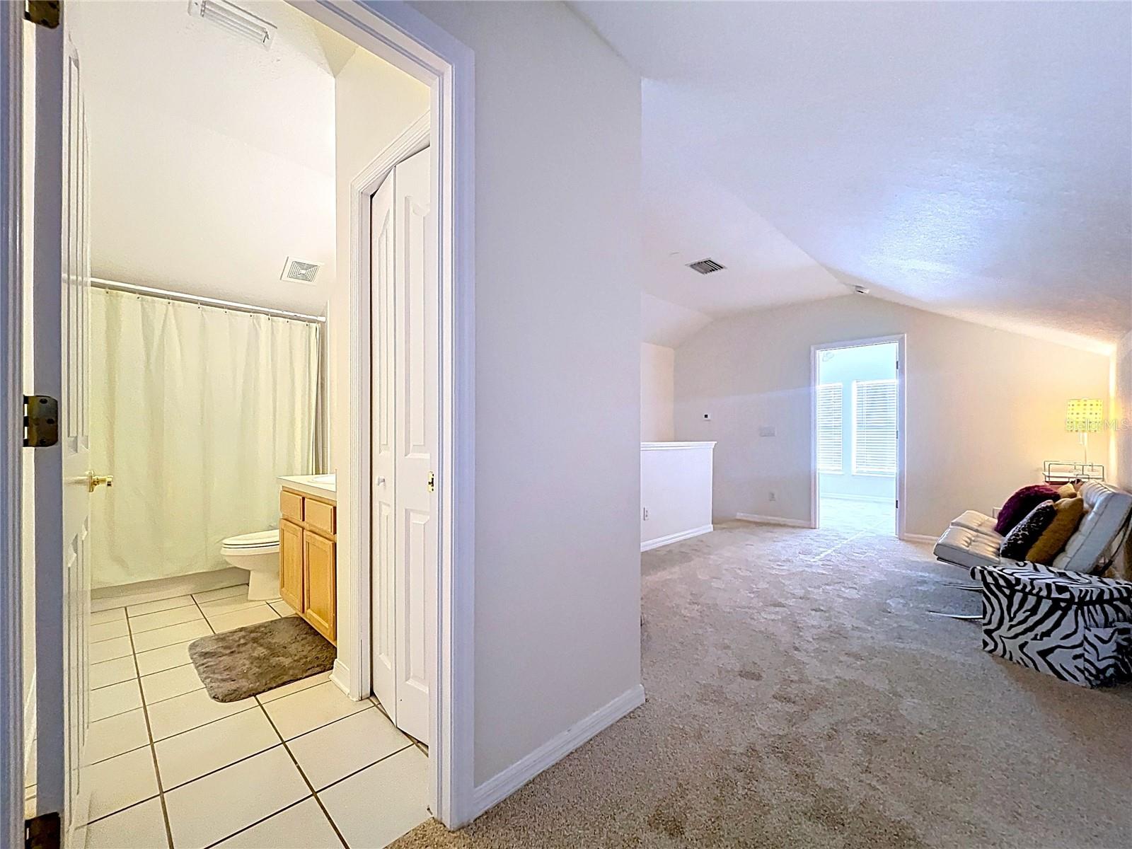 View of Upstairs Guest BA and Loft area inbetween Guest BR's 3 & 4