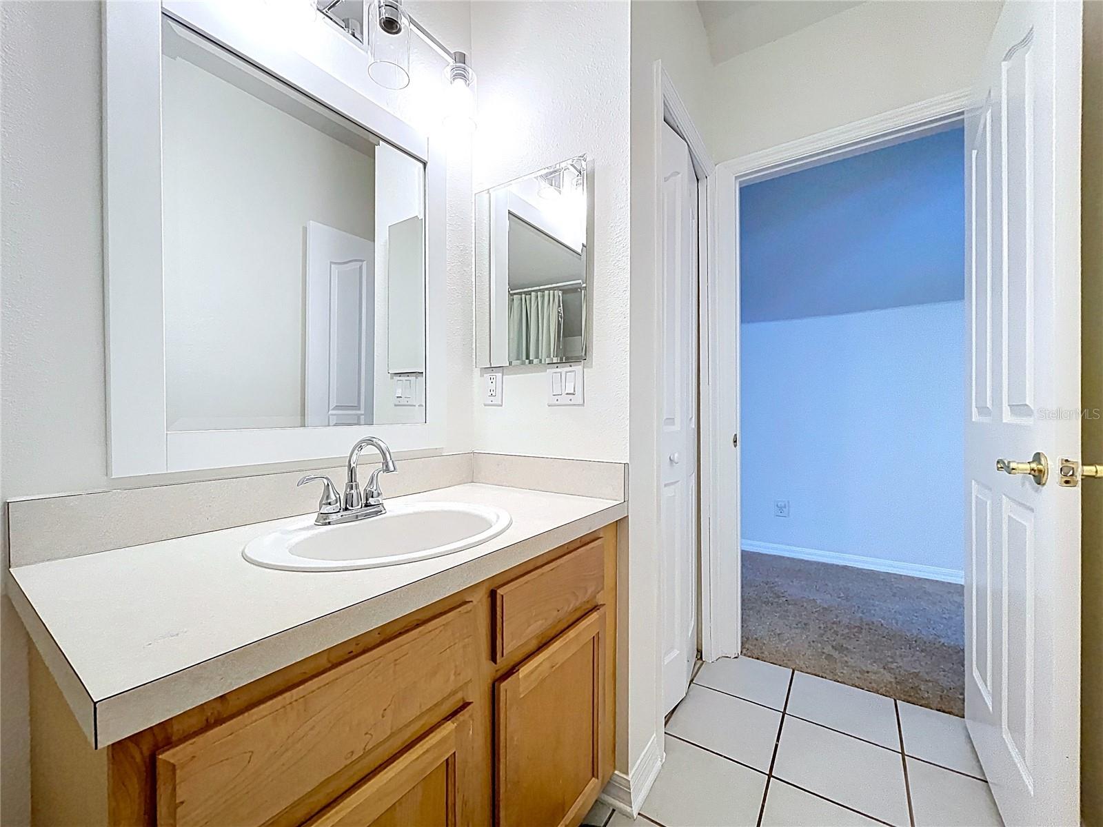 Upstairs Guest BA View - 2 new mirrors, water & lighting fixtures