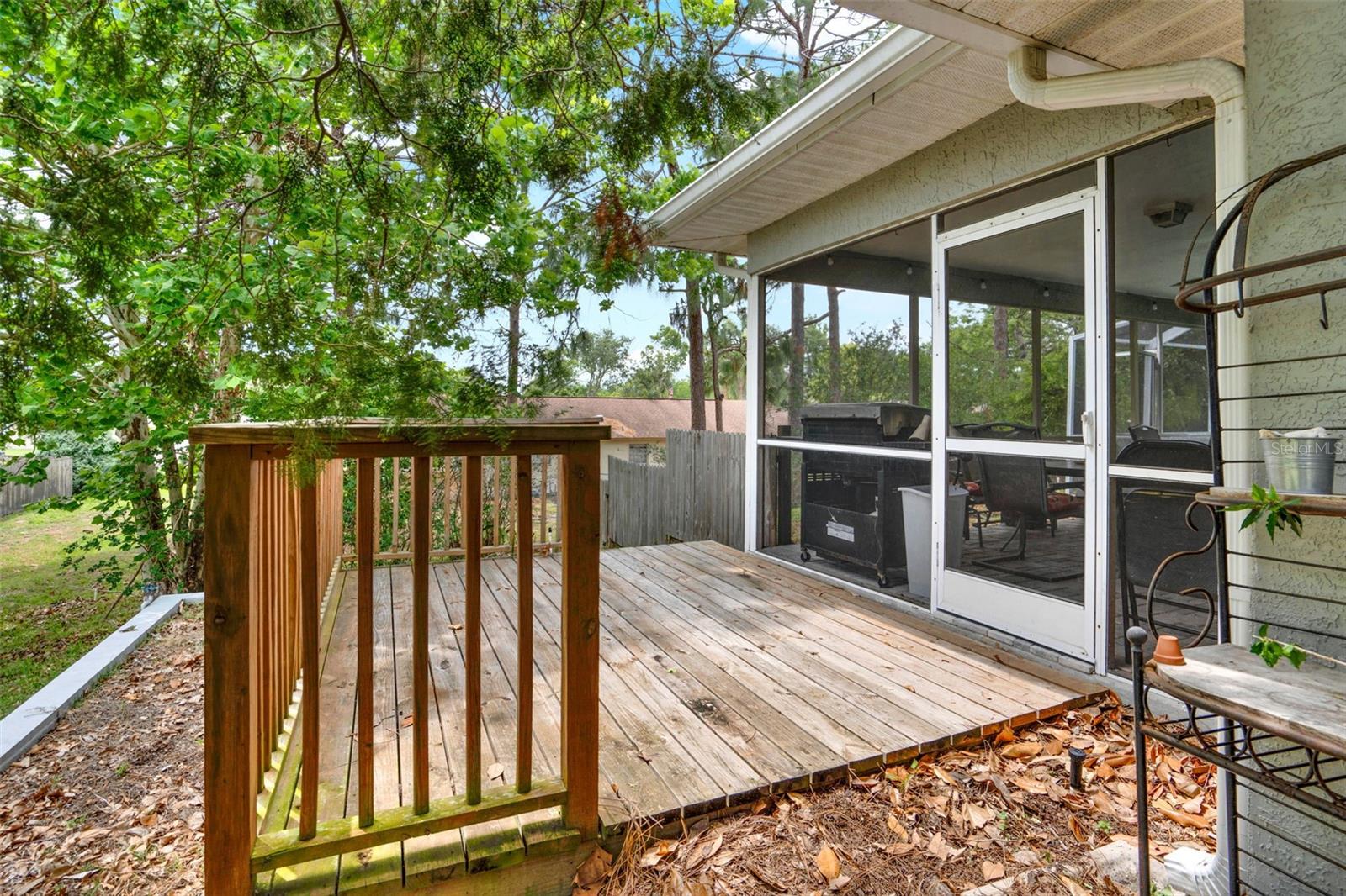 DECK IN BACK OF HOUSE