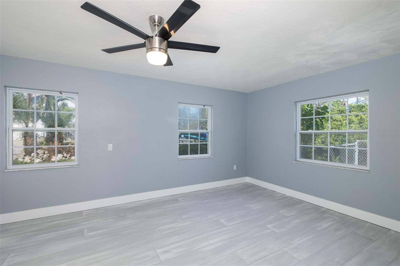 Spare Bedroom with tons of light and multiple windows