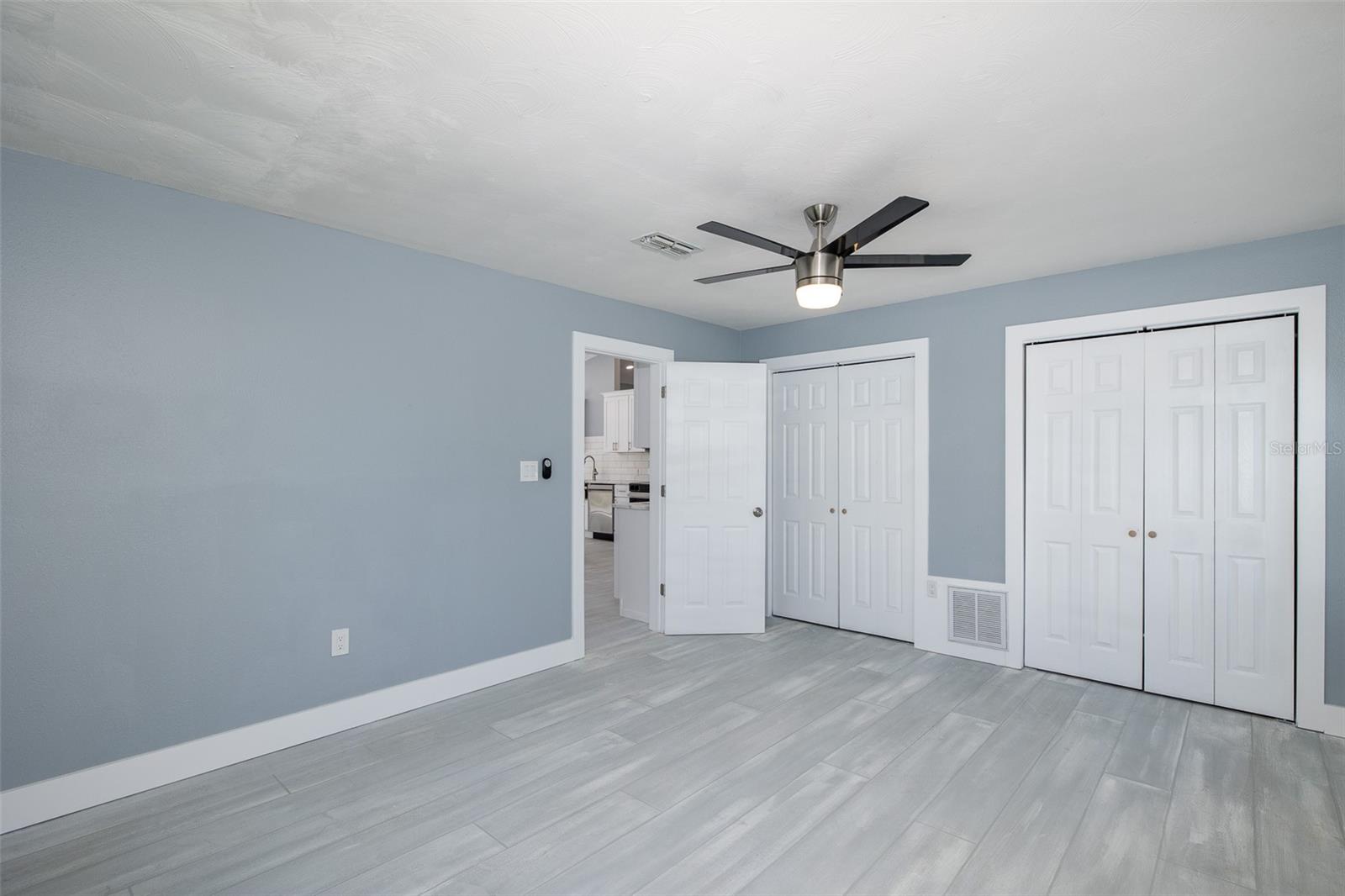 Spare Bedroom with tons of light and multiple windows