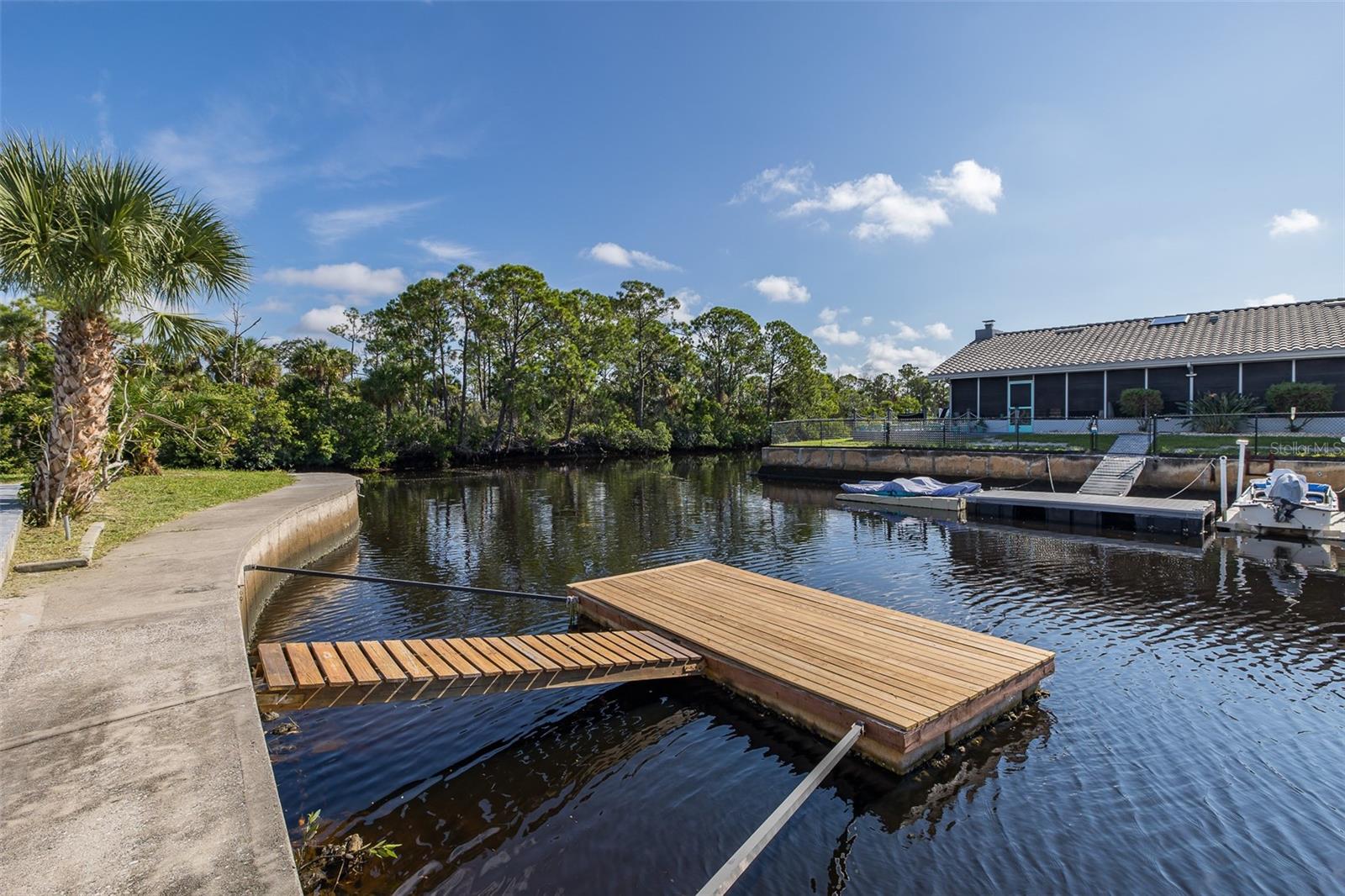 Large Corner Lot with seawall and floating dock