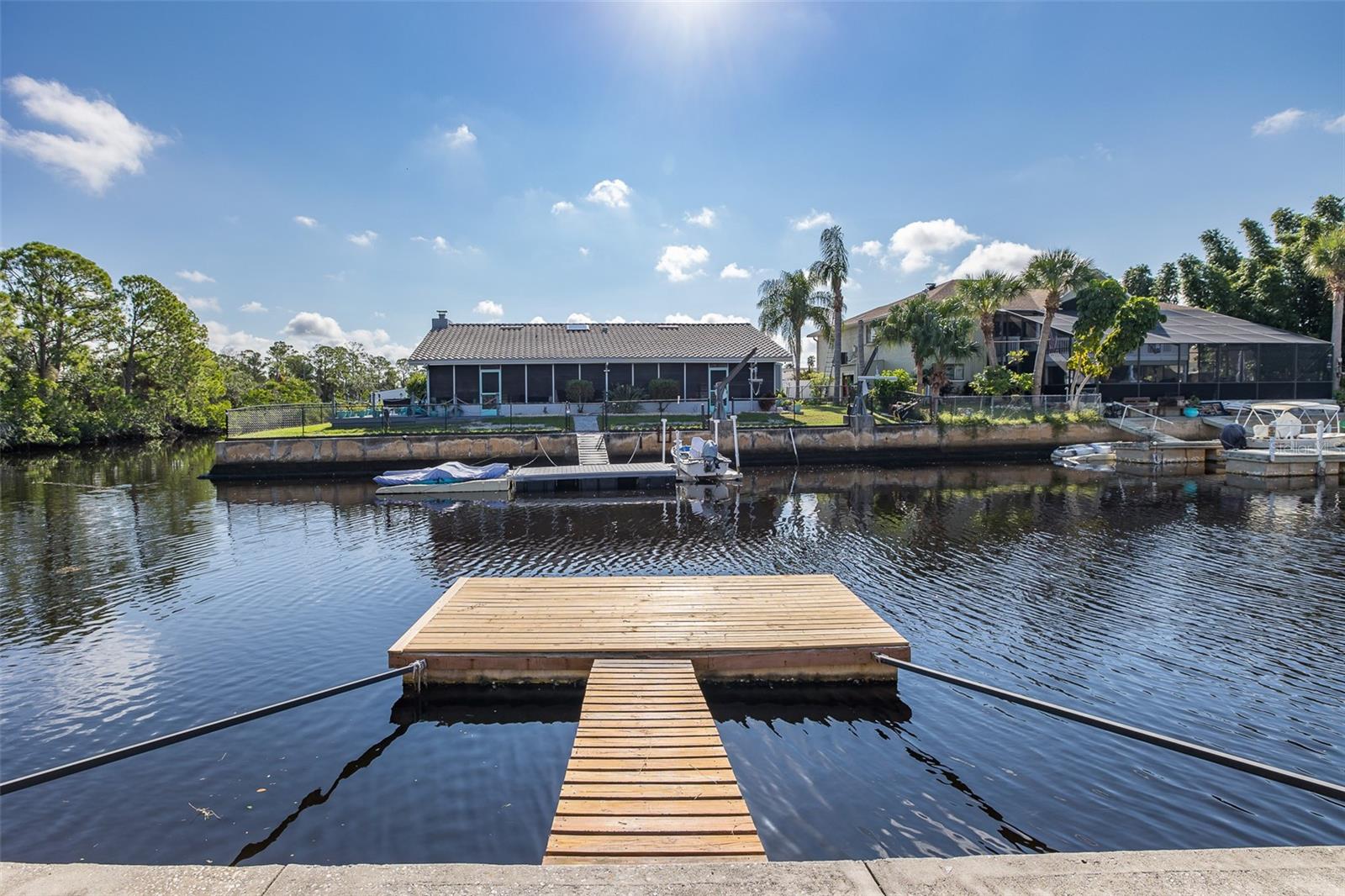 Large Corner Lot with seawall and floating dock