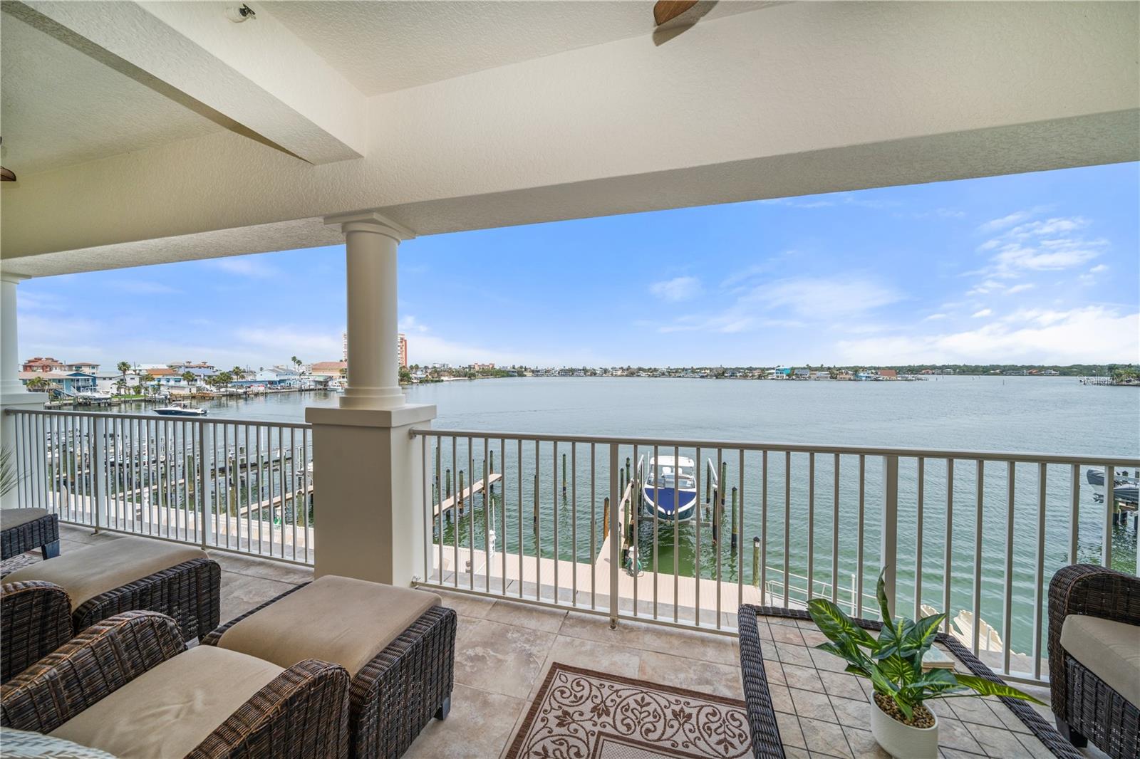 Living room balcony has extended area that feels like a second family room to enjoy those great sunsets