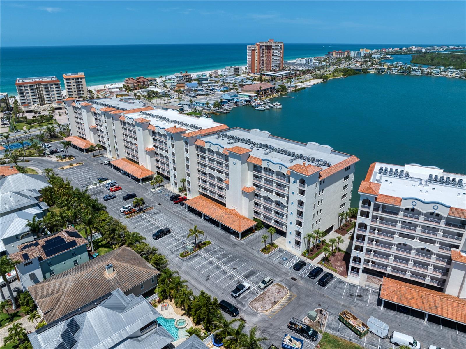 Front exterior aerial with back exterior waterfront views