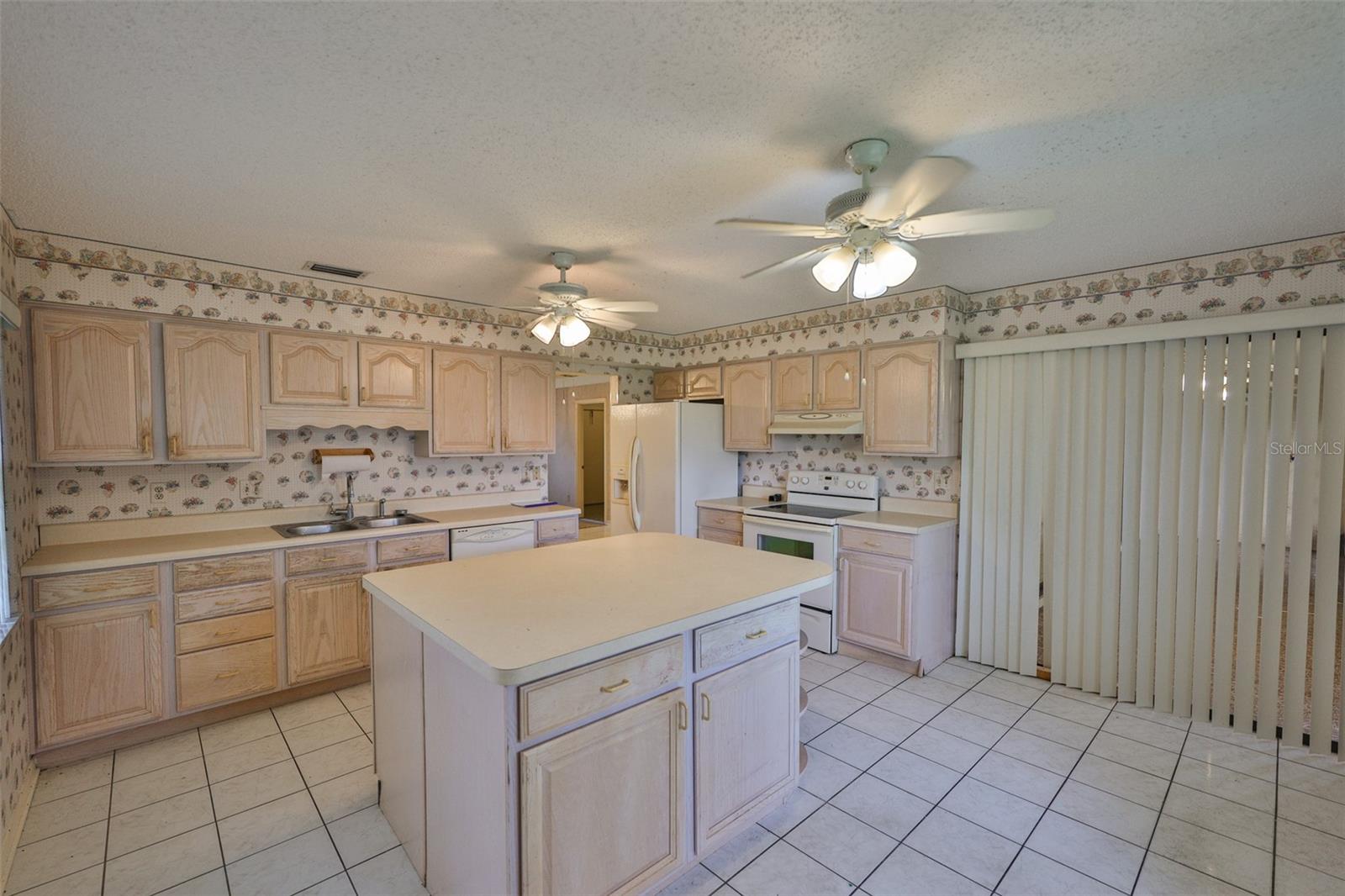 Kitchen is an excellent size with a center island and lots of counter space.