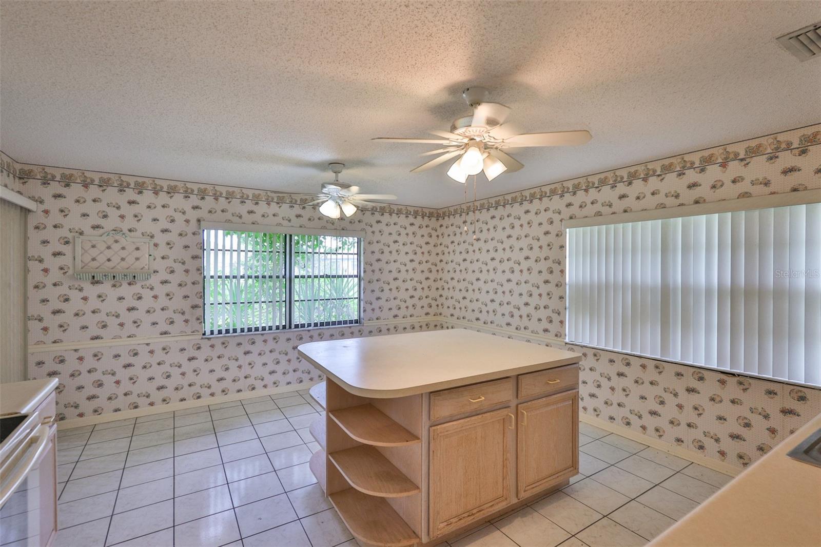 Plenty of space for a table and chairs with large windows to enjoy the Florida sunshine.