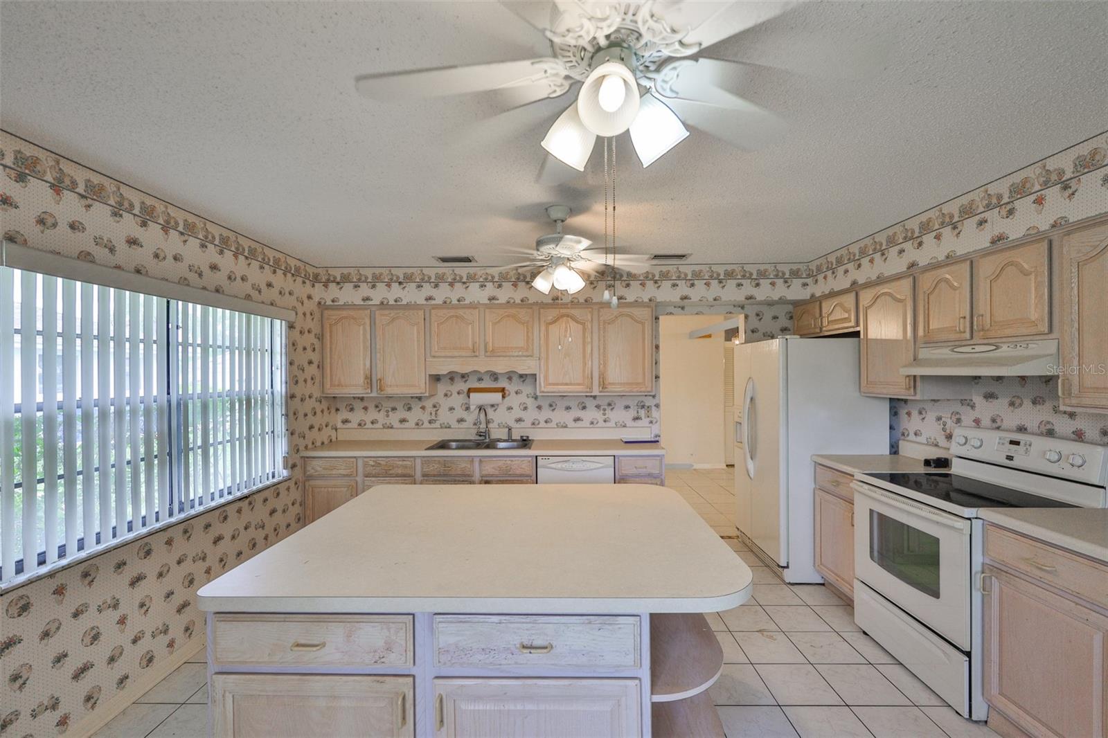 Kitchen cabinetry is quite nice with lots of storage.