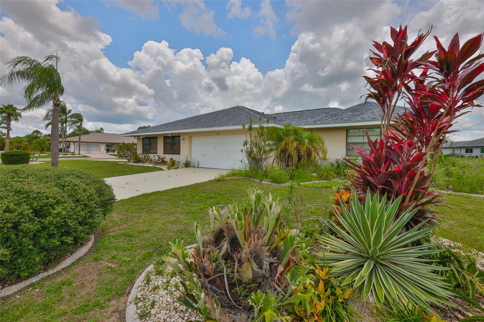 Lots of mature landscaping with custom curbing in the front, side and rear yard.
