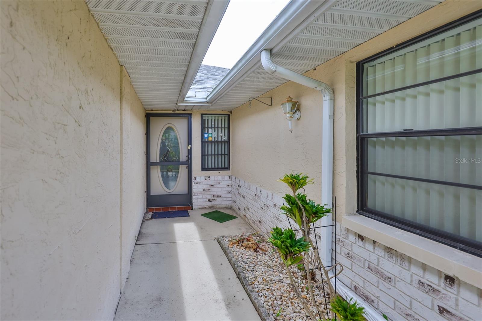 The front entry way is enclosed with a gate.