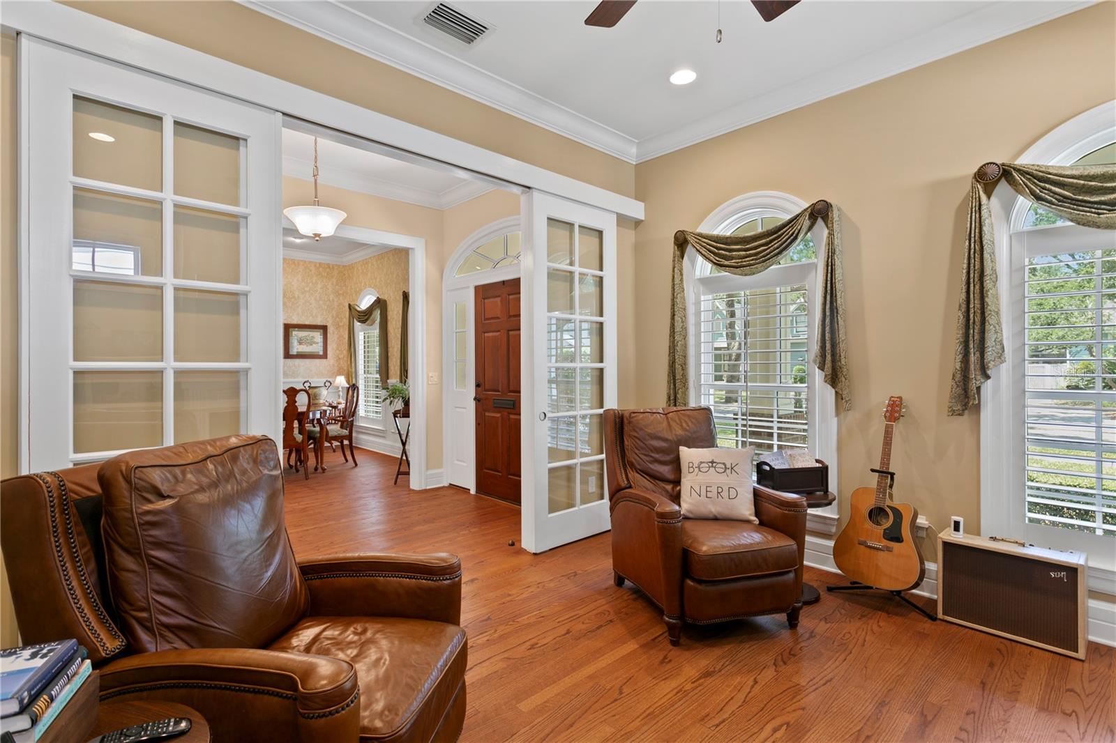 Elegant French pocket doors allow the space to be closed off for added privacy without sacrificing natural light or charm.