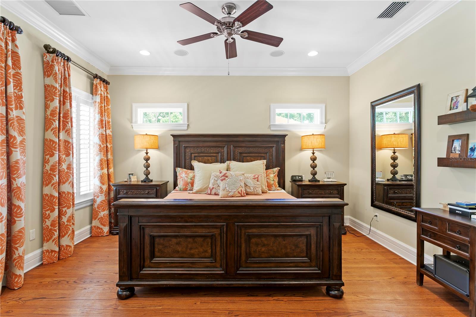 The primary suite spans the entire width of the home.