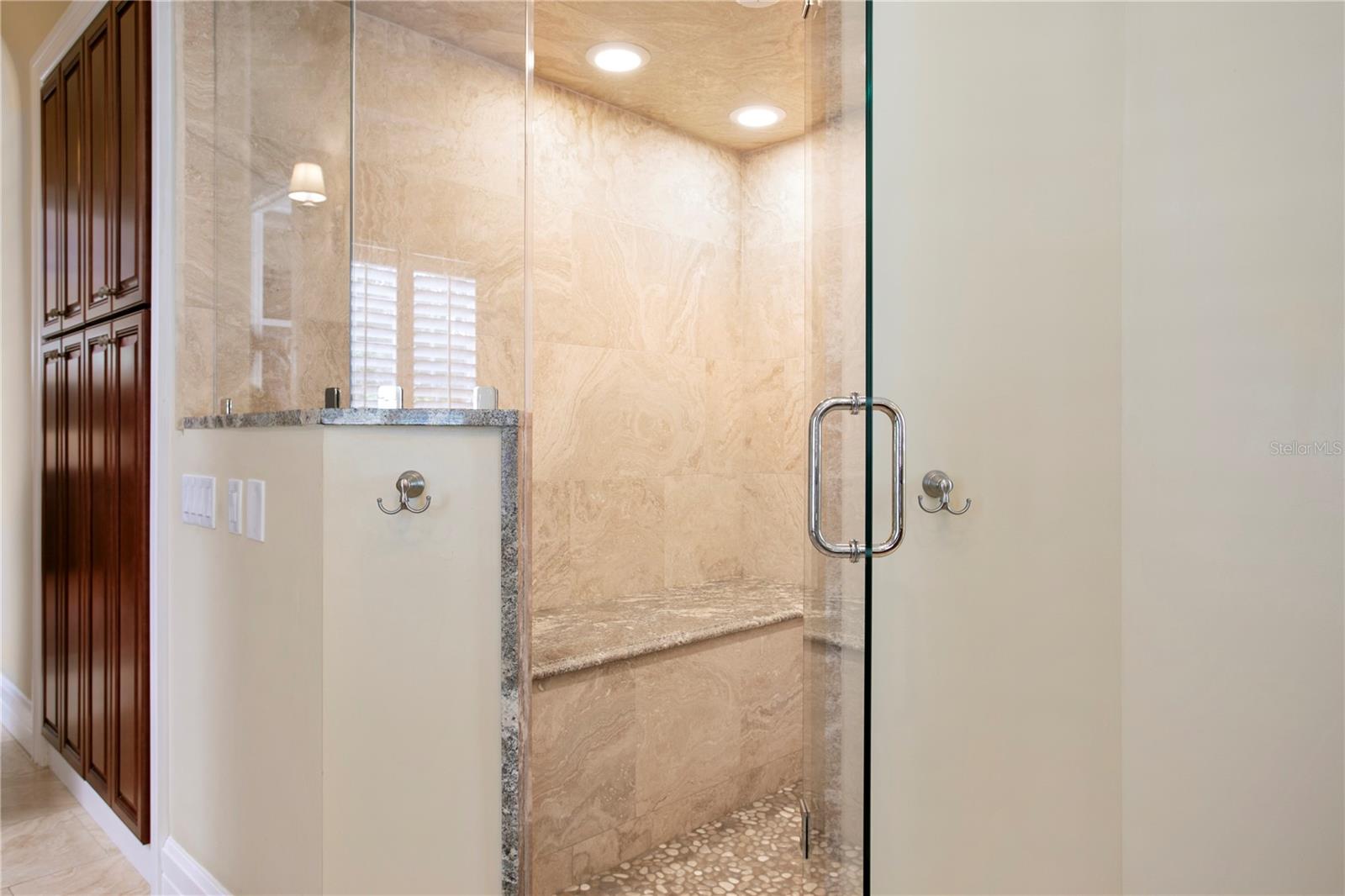 The bathroom is complete with a steam shower.