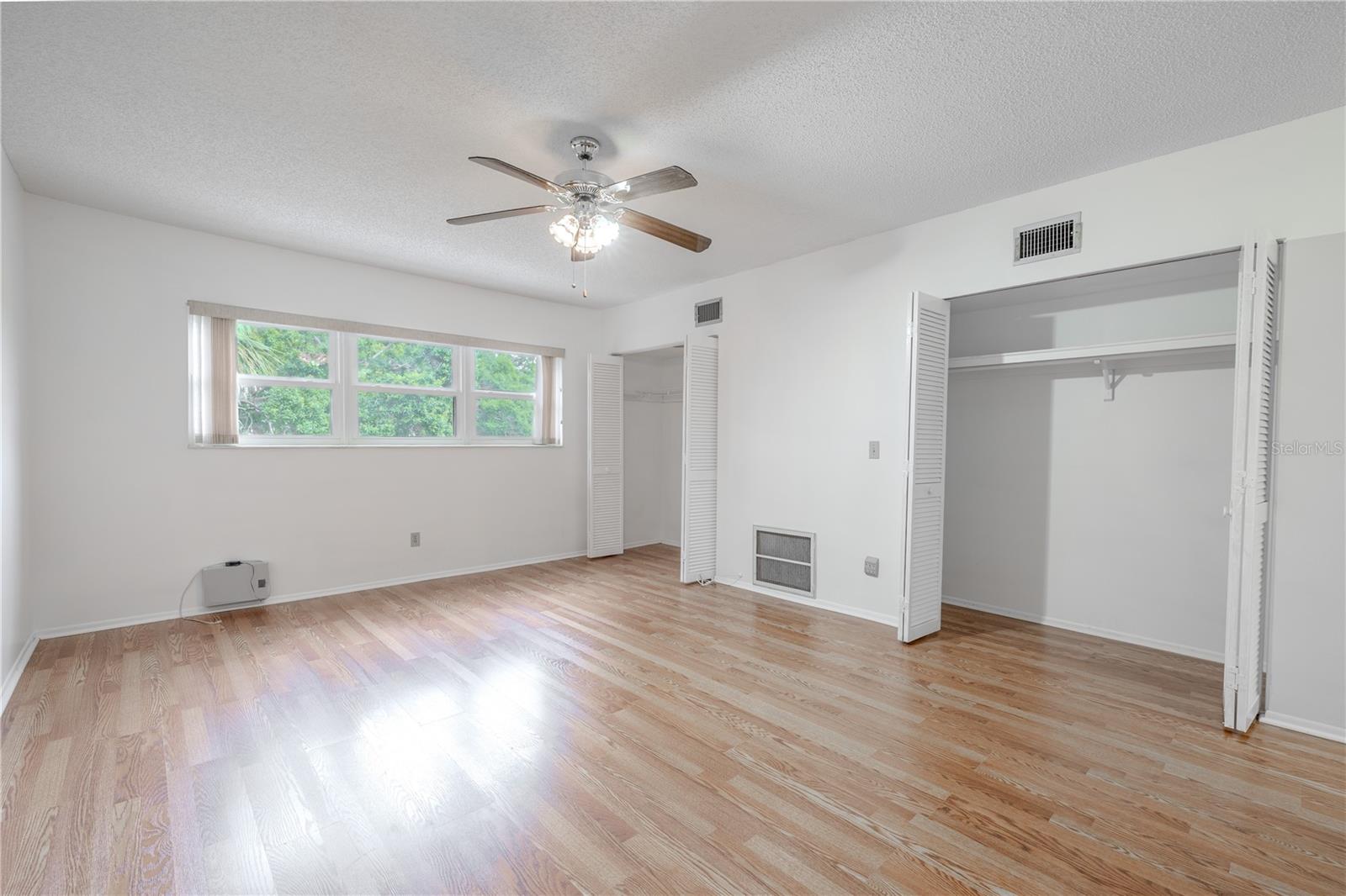 The primary bedroom features dual built-in closets.