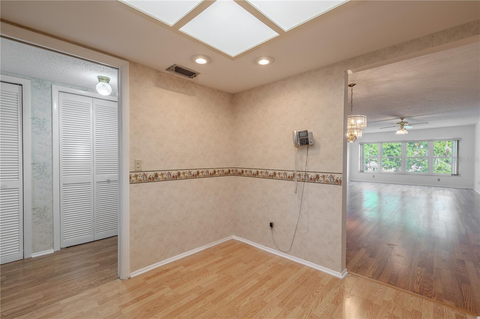 The kitchen is open to the foyer and living/dining rooms.
