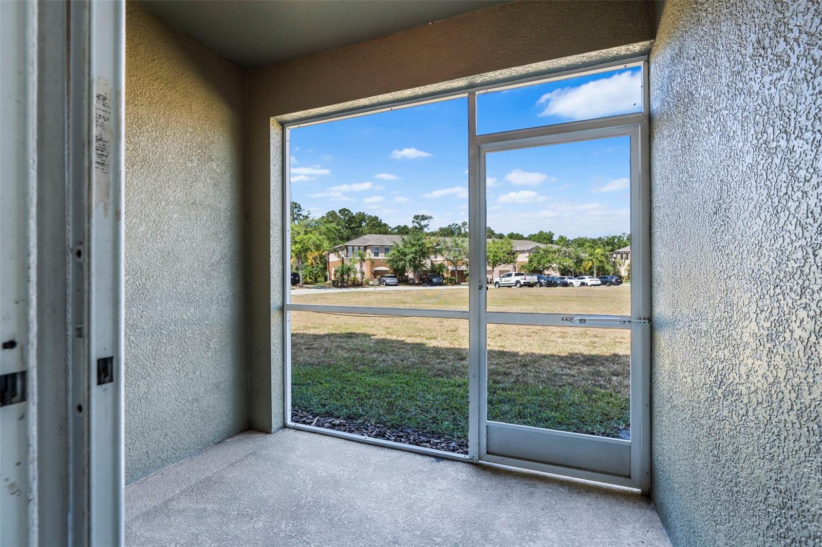 Backyard screened in patio