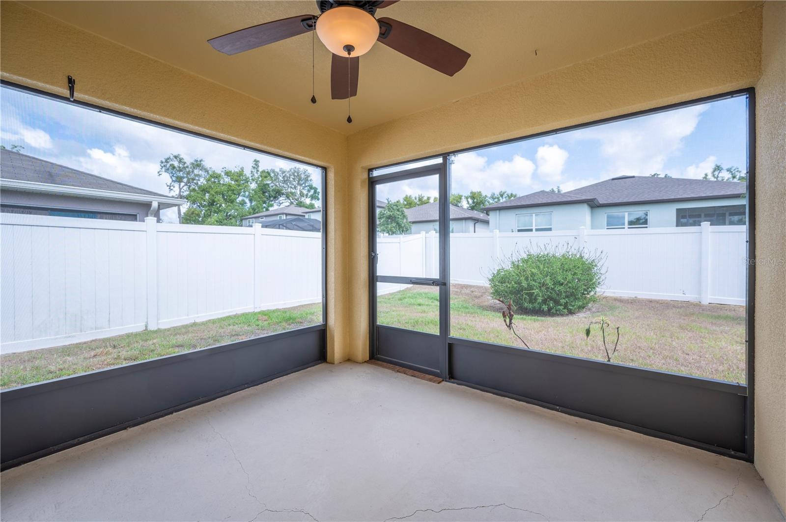 Back Screened Porch overlooking Privacy Fenced Yard
