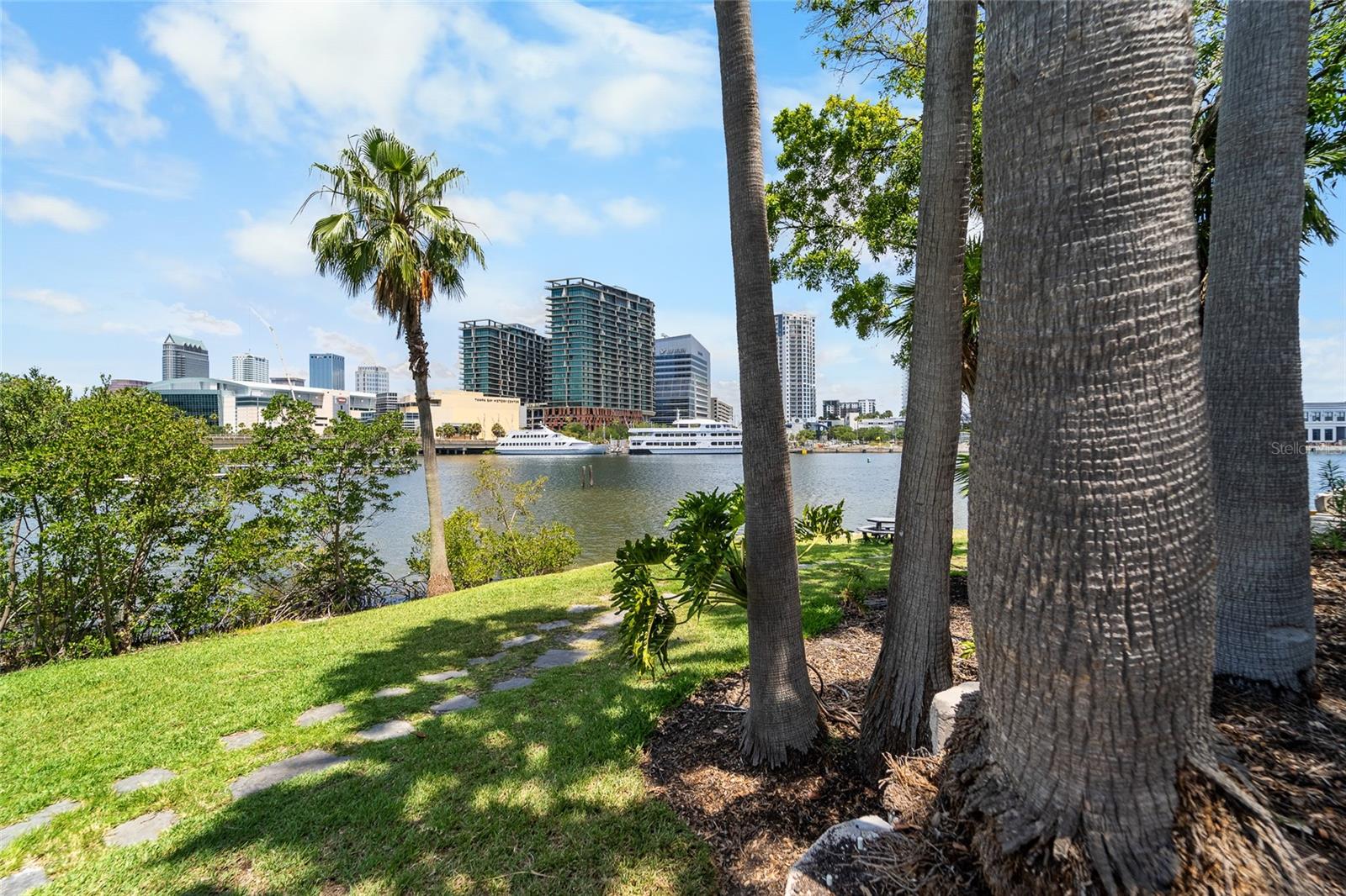 Private park with benches and tables. Access to the Channel.
