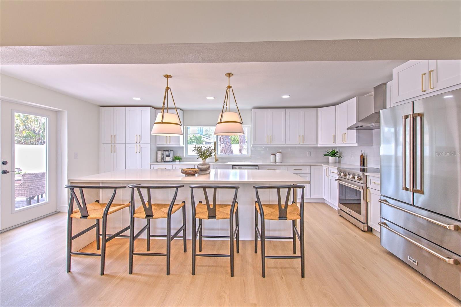 Chef's Kitchen with French Doors to the backyard