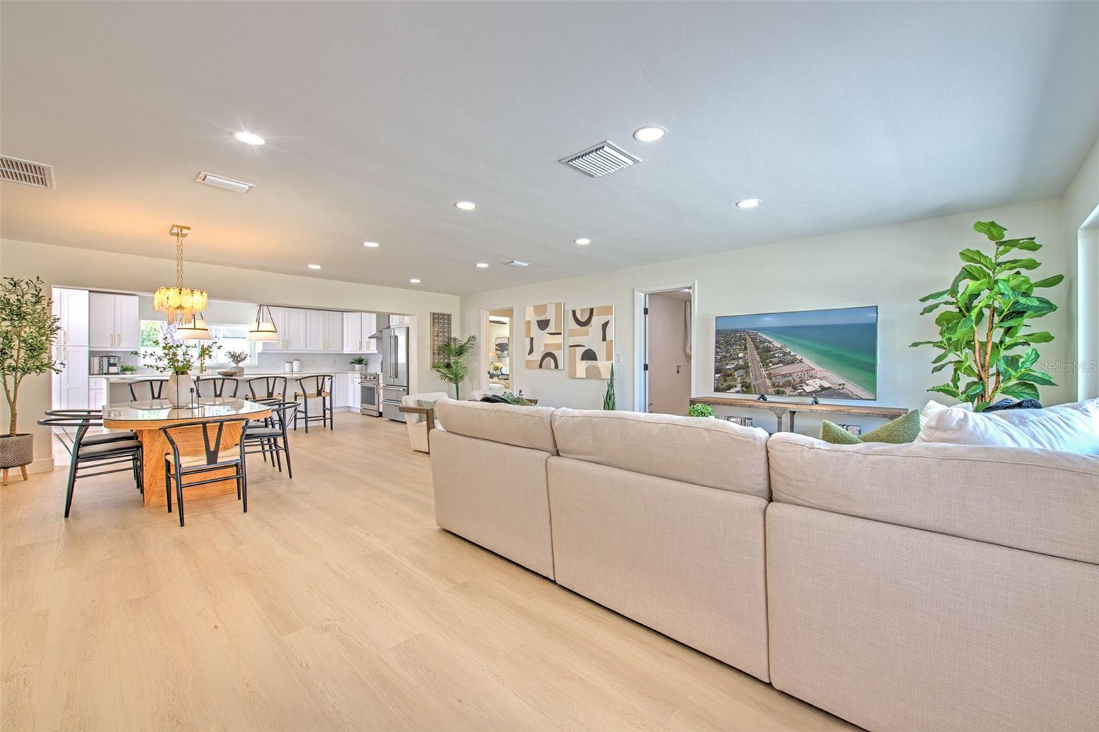 Open Floor plan with views of the Family Room, Dining Area, and Kitchen