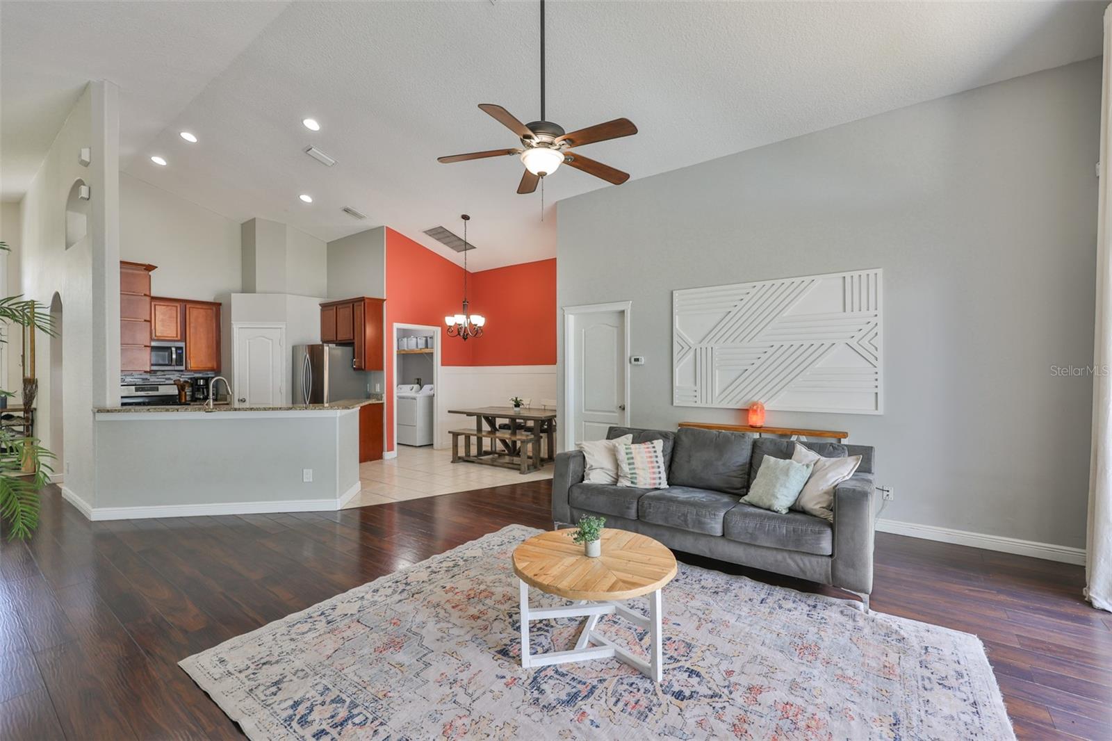 Ceiling fan overhead from this very high vaulted ceiling