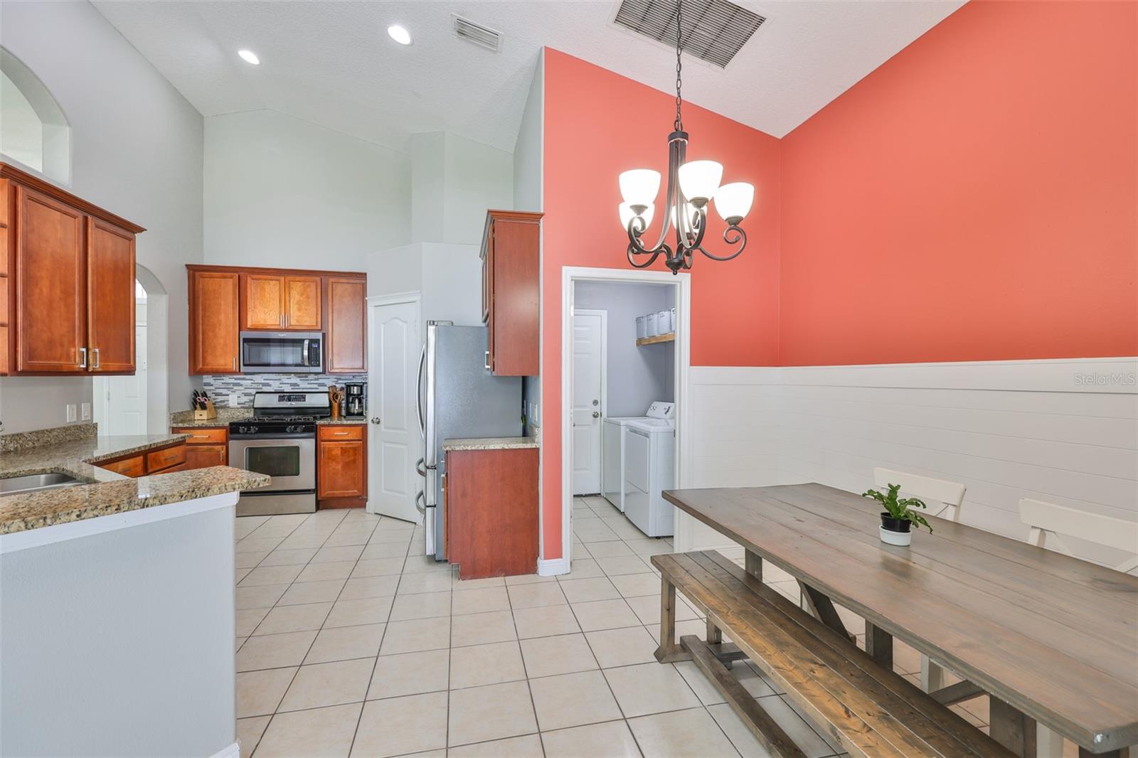 The laundry room is just off the kitchen - convenient!