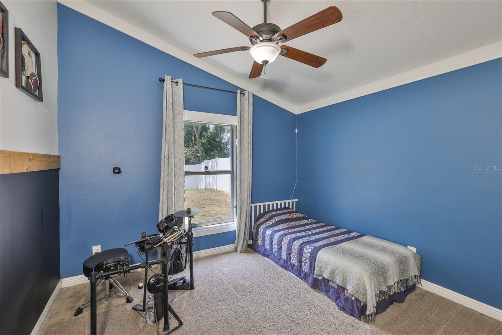 Bedroom 2 with vaulted ceiling