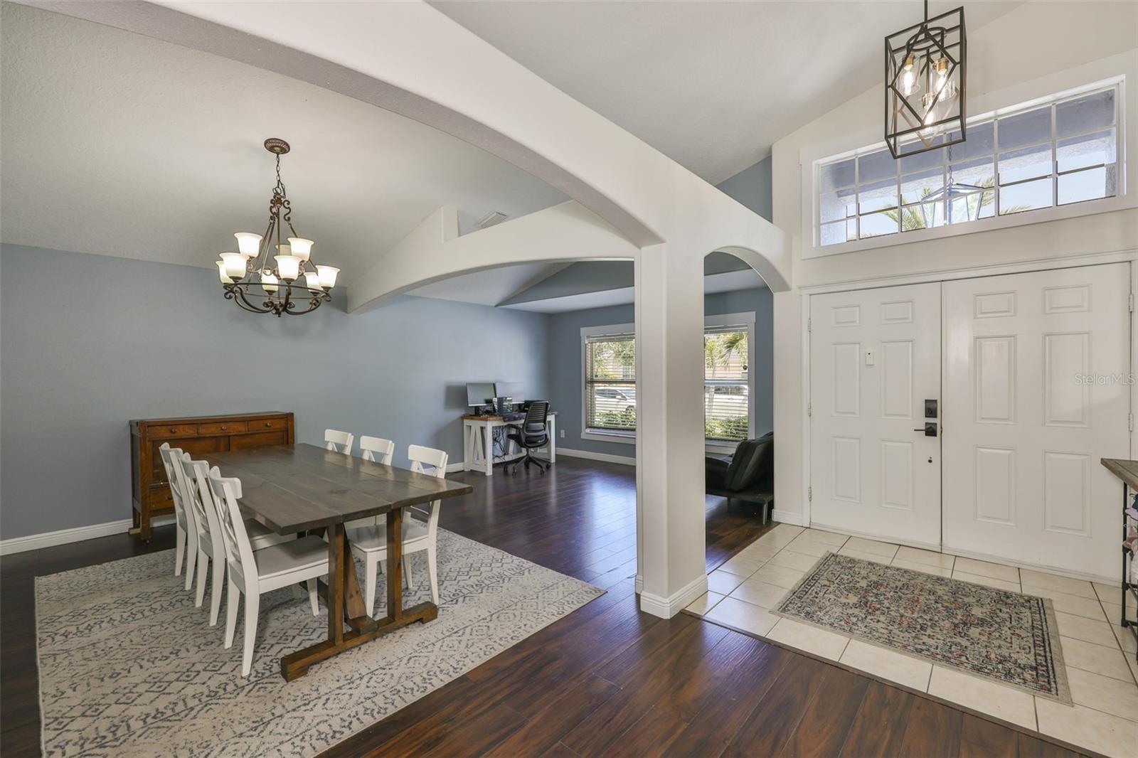 Step into the foyer to the formal living and dining rooms