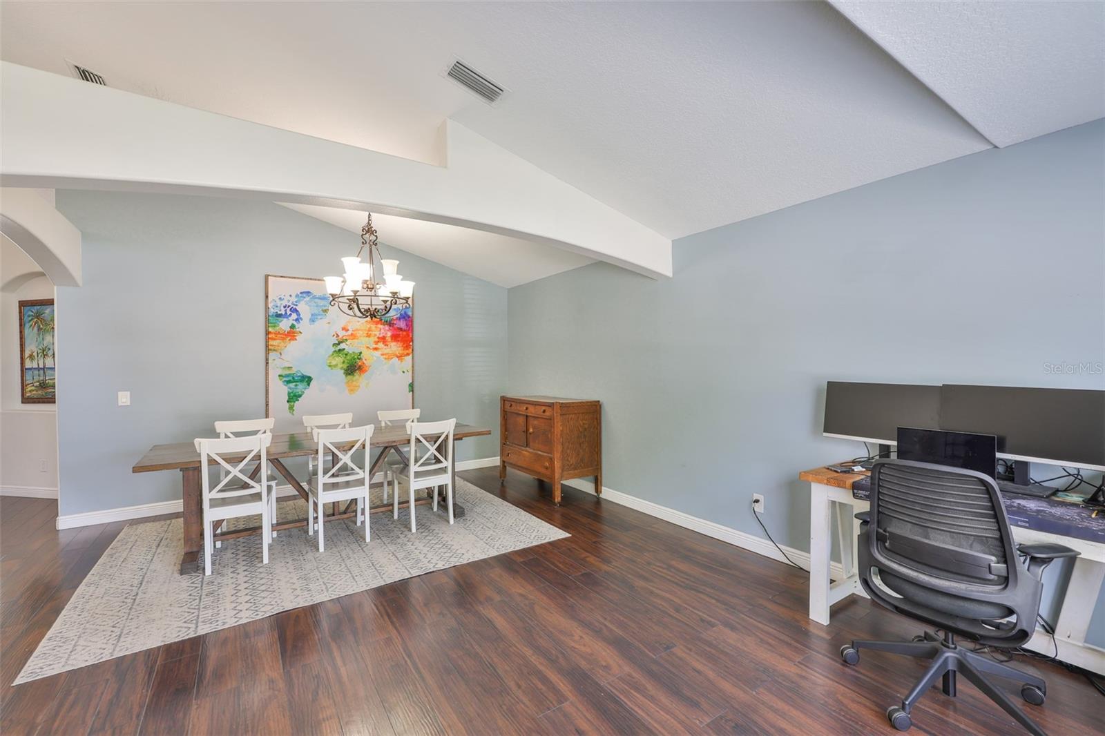 Use your imagination in this front room. Office? Den? Formal living room?