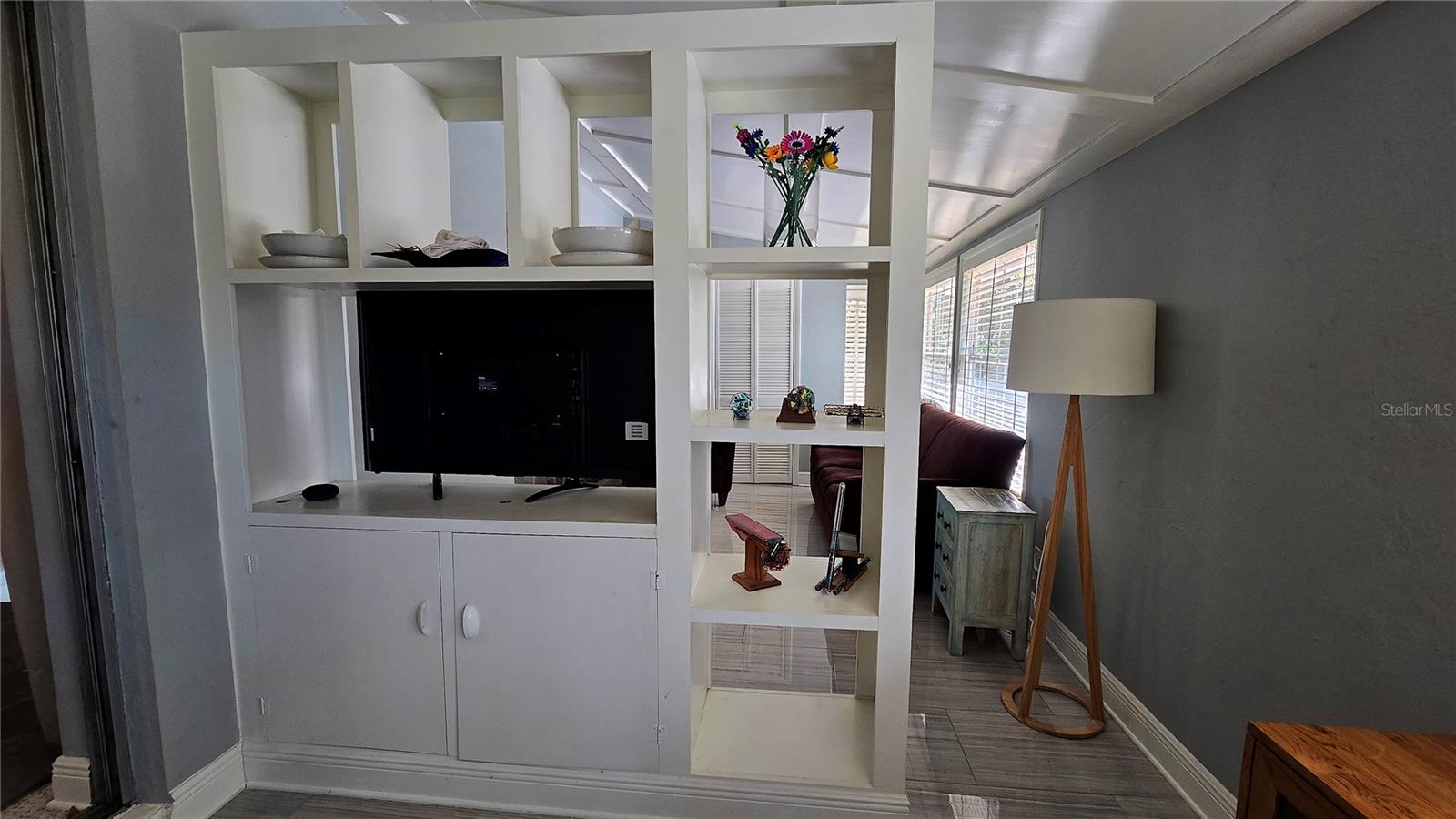 Nice built in shelving between the Family Room and Office Space