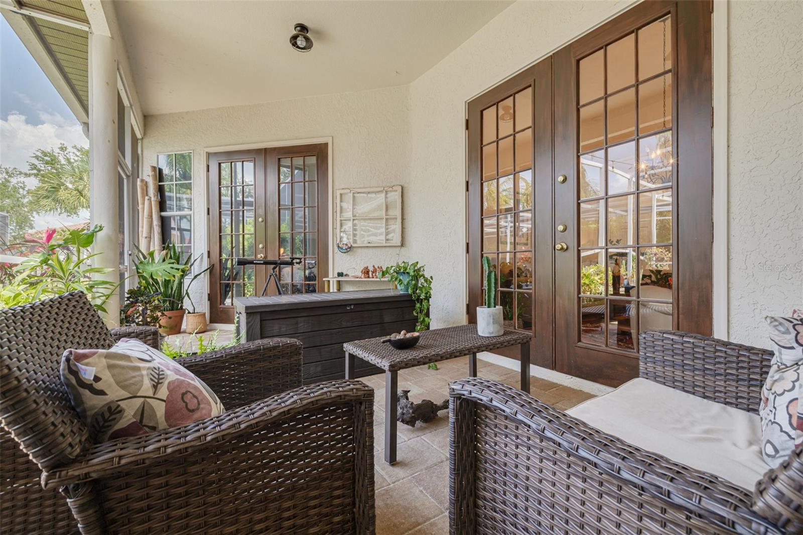 Outdoor living space with access to master bedroom, living room and family room