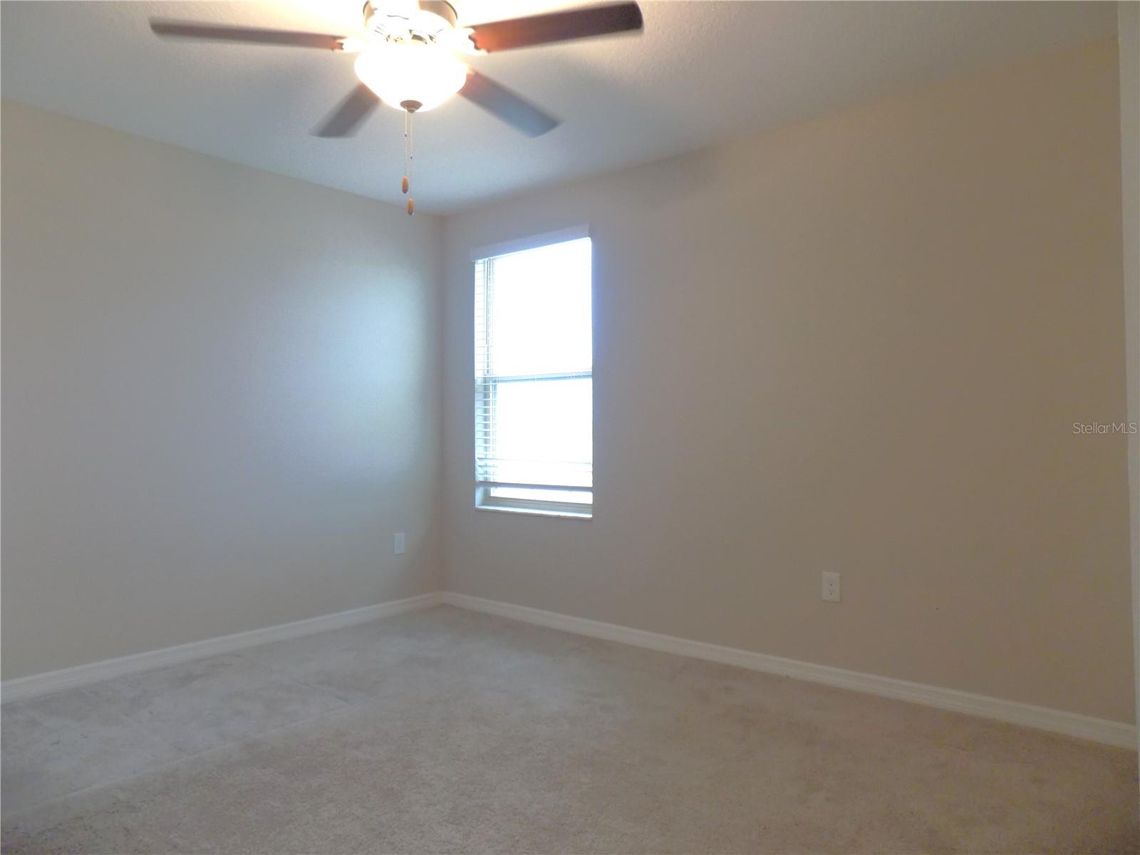Bedroom 5, which also enjoys a view of the pond