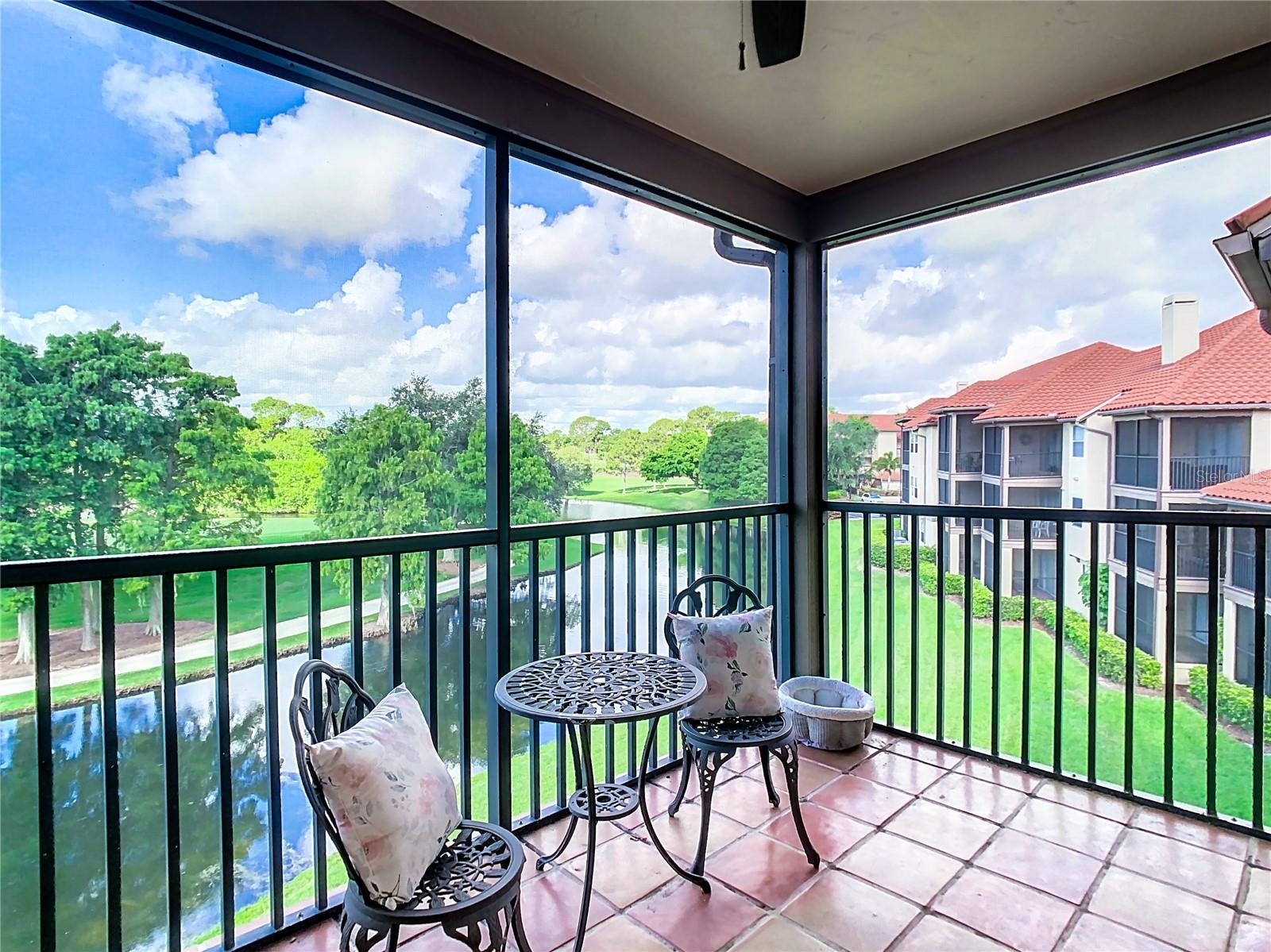 Perfect screened living space overlooking a peaceful canal.