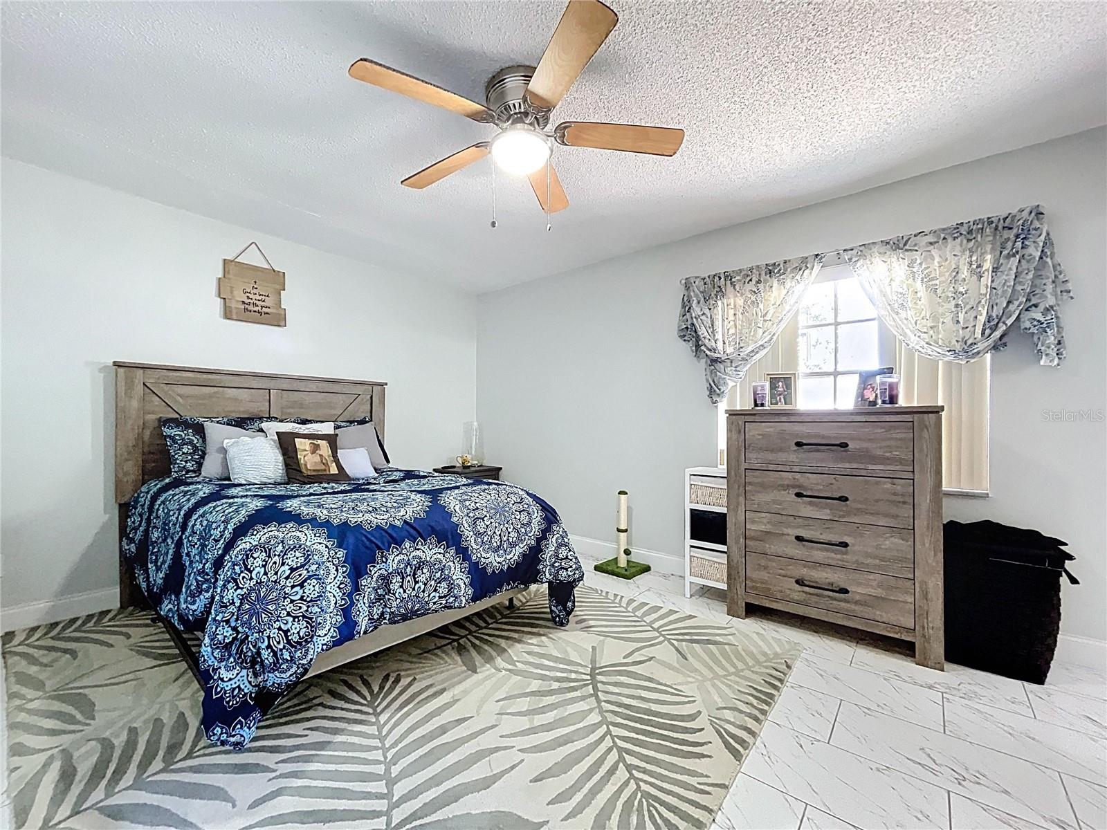 Spacious Primary bedroom.