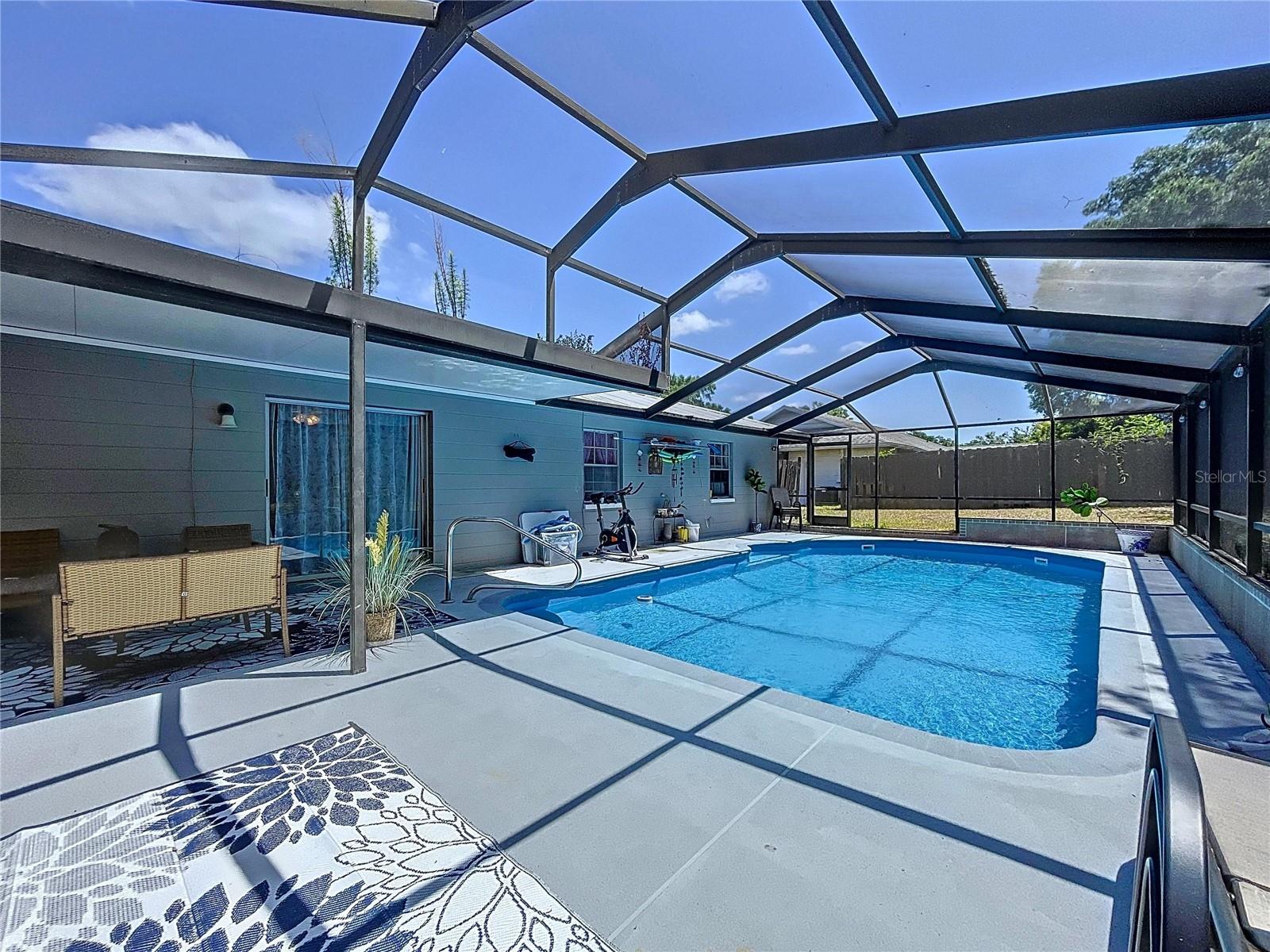 Pool features a new pool pump and freshly painted surface.
