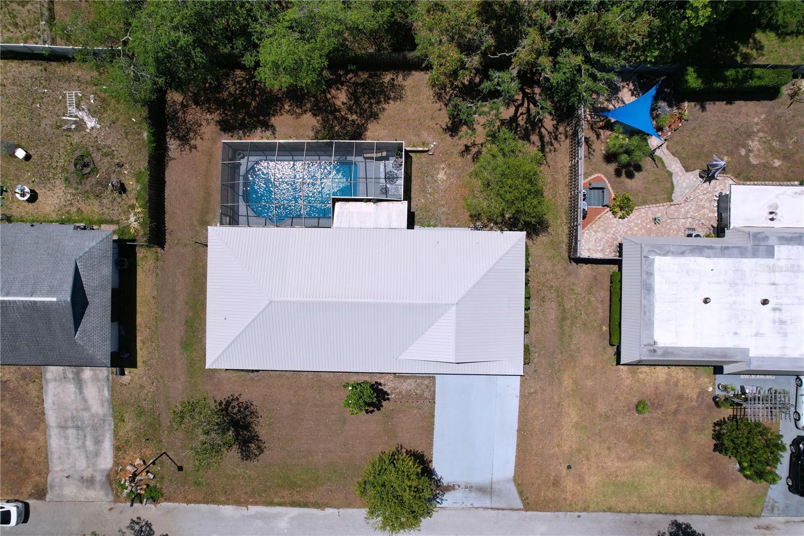 Brooksville pool home with plenty of yard space for outdoor activities or your family pets.