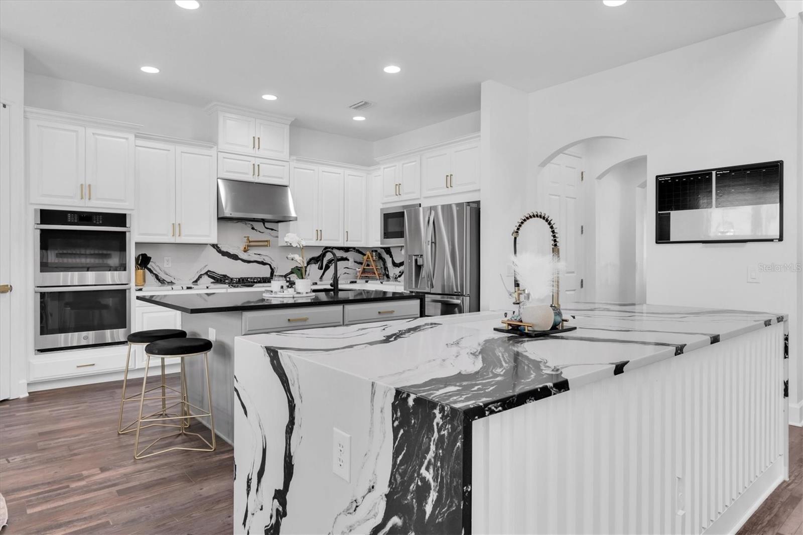 Gourmet Kitchen w/ Double Oven, Pot Filler, Gas Range, Dual Island