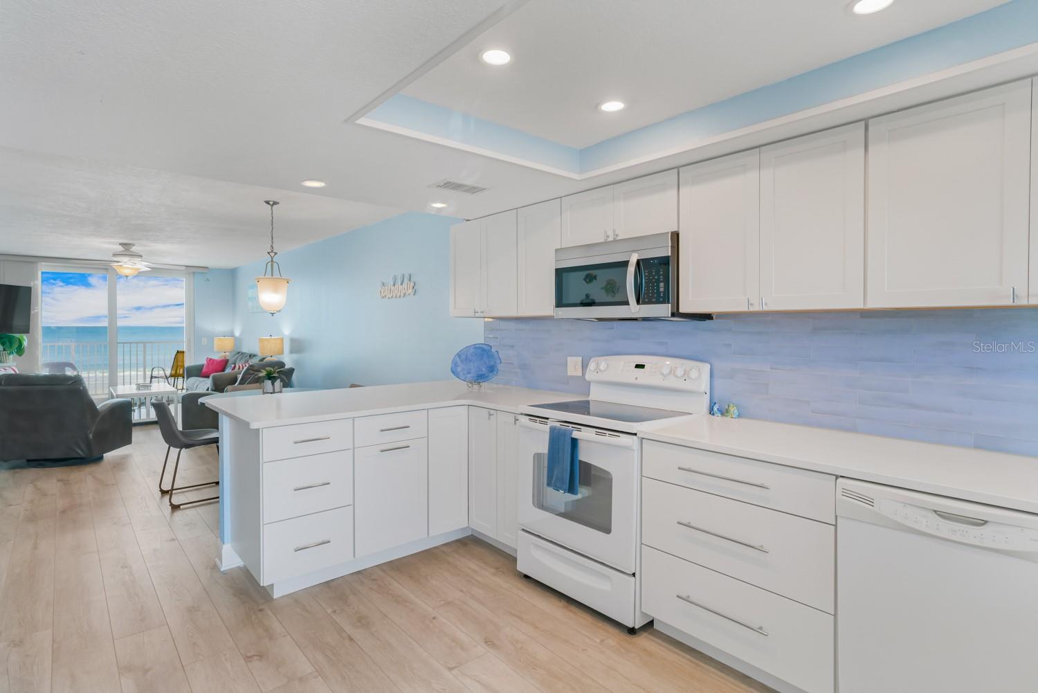 Open Floor Plan from Kitchen to Dining and Living Area with beautiful views.