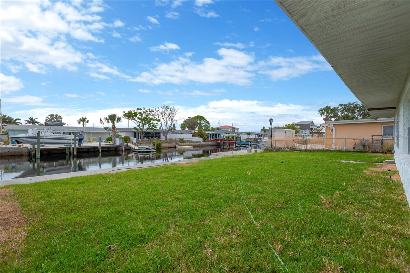 View from backyard.  Thinking of getting a boat or jet ski?  Explore the opportunity to put in your own private dock.