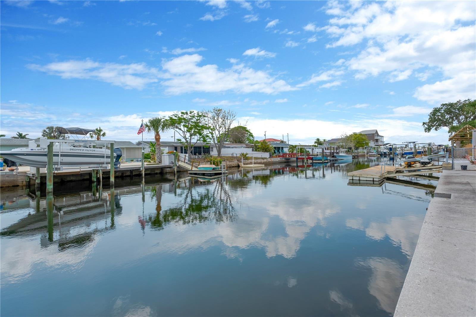 Picturesque canal waters leading out to open Gulf waters.  Almost looks like a watercolor painting.