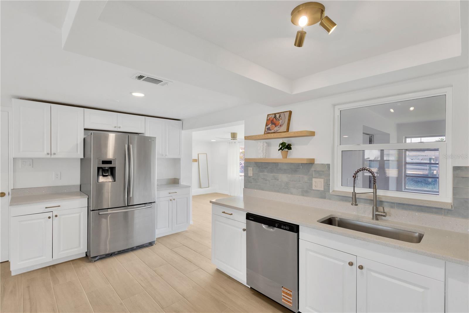 Close up view of kitchen as it leads to Family Room.