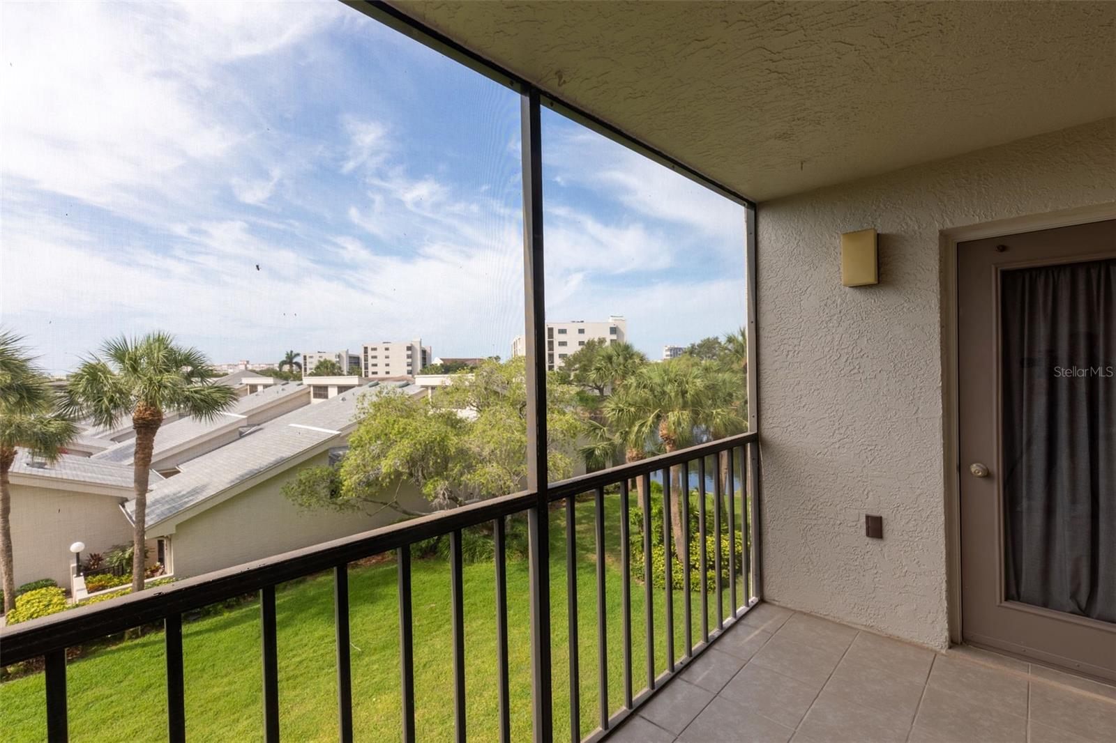 Balcony with partial view of Pond