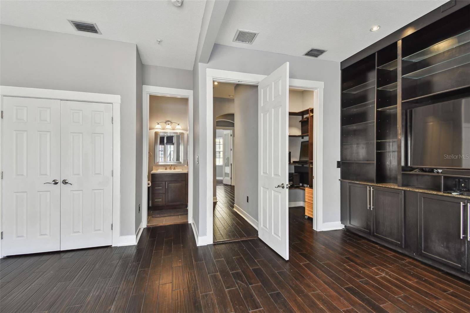 2nd Bedroom has 2 closets + built in shelving