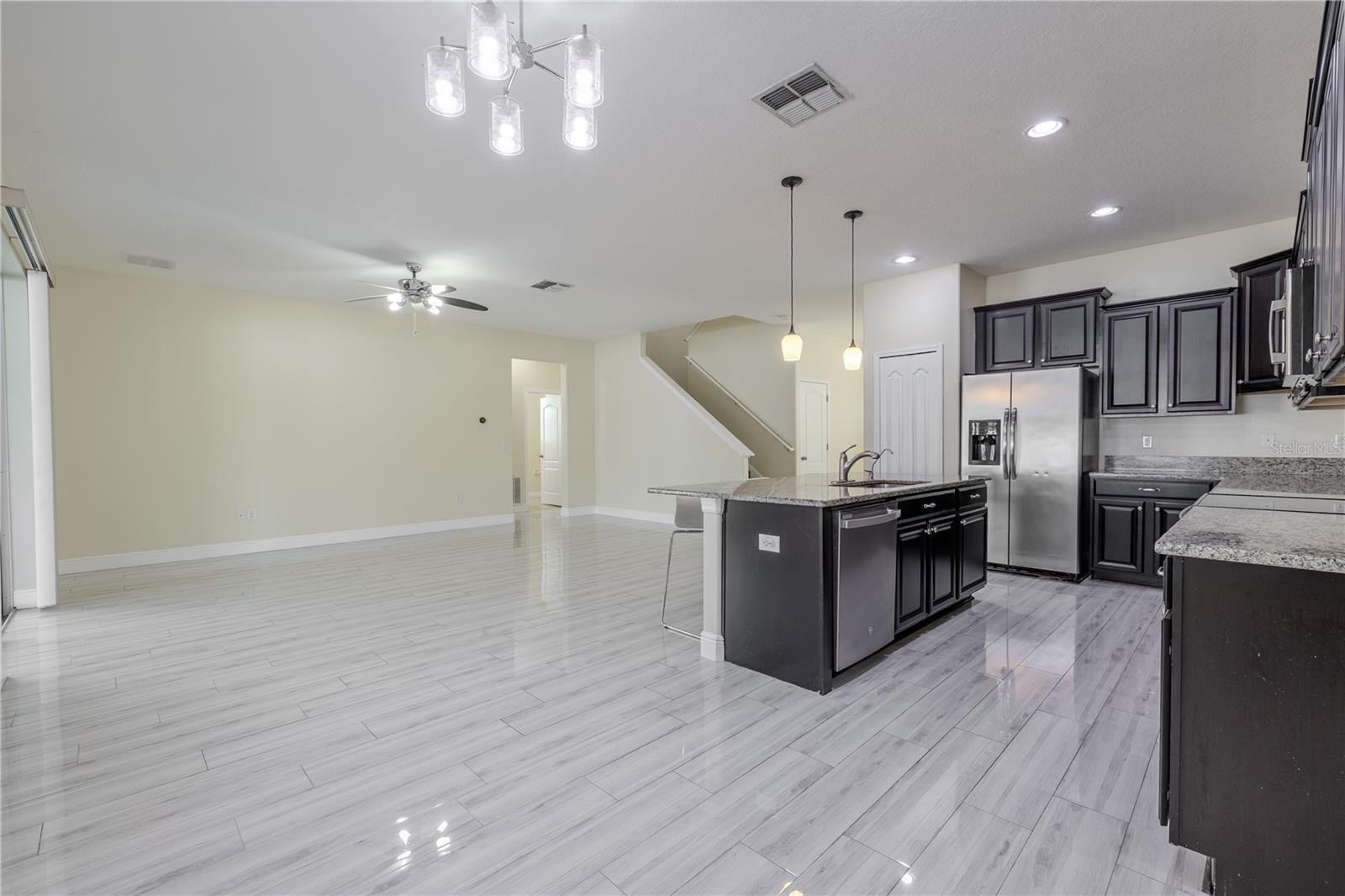 View of kitchen and family room from dinette