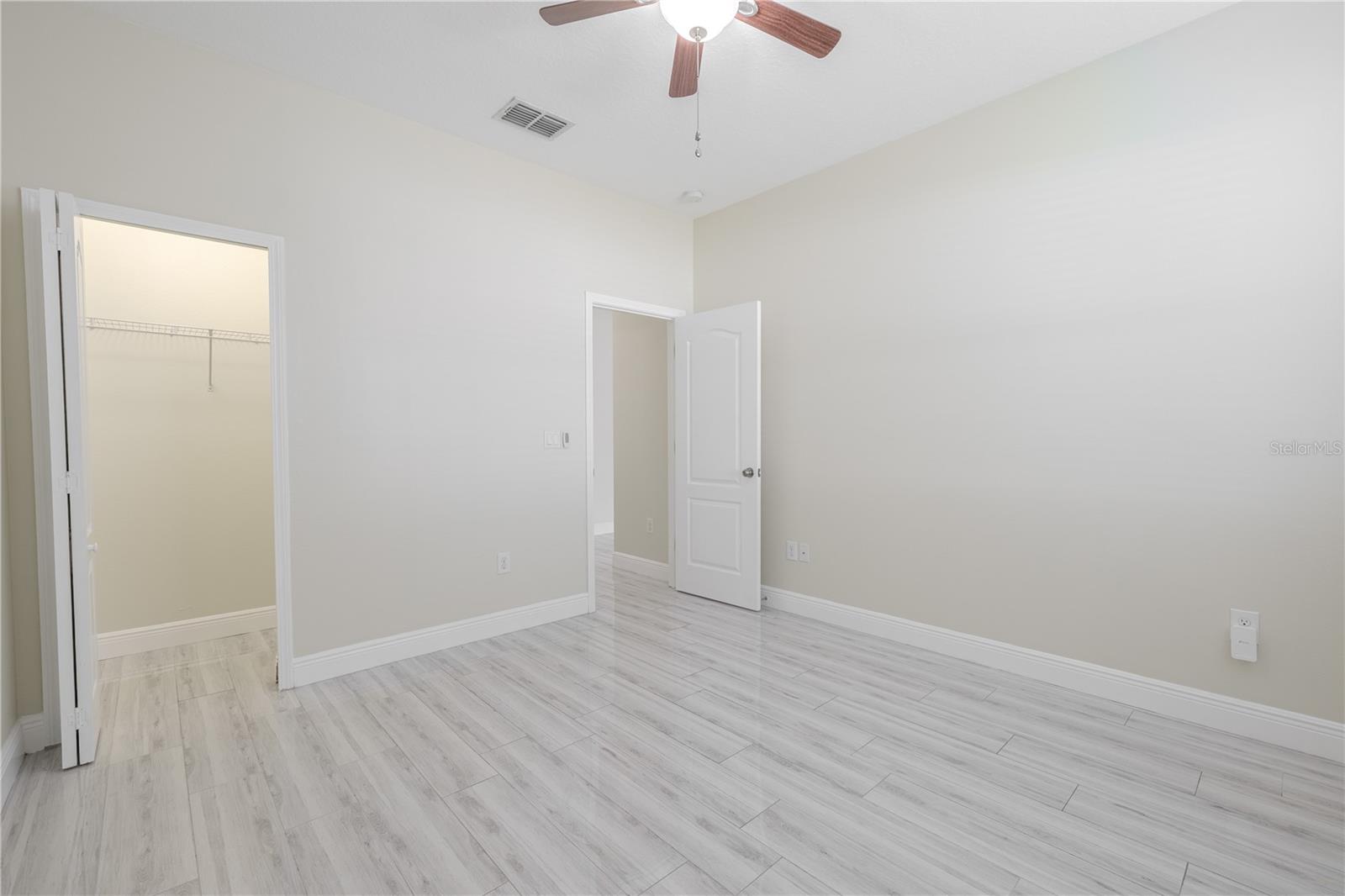 The 4th bedroom features a walk-in closet.