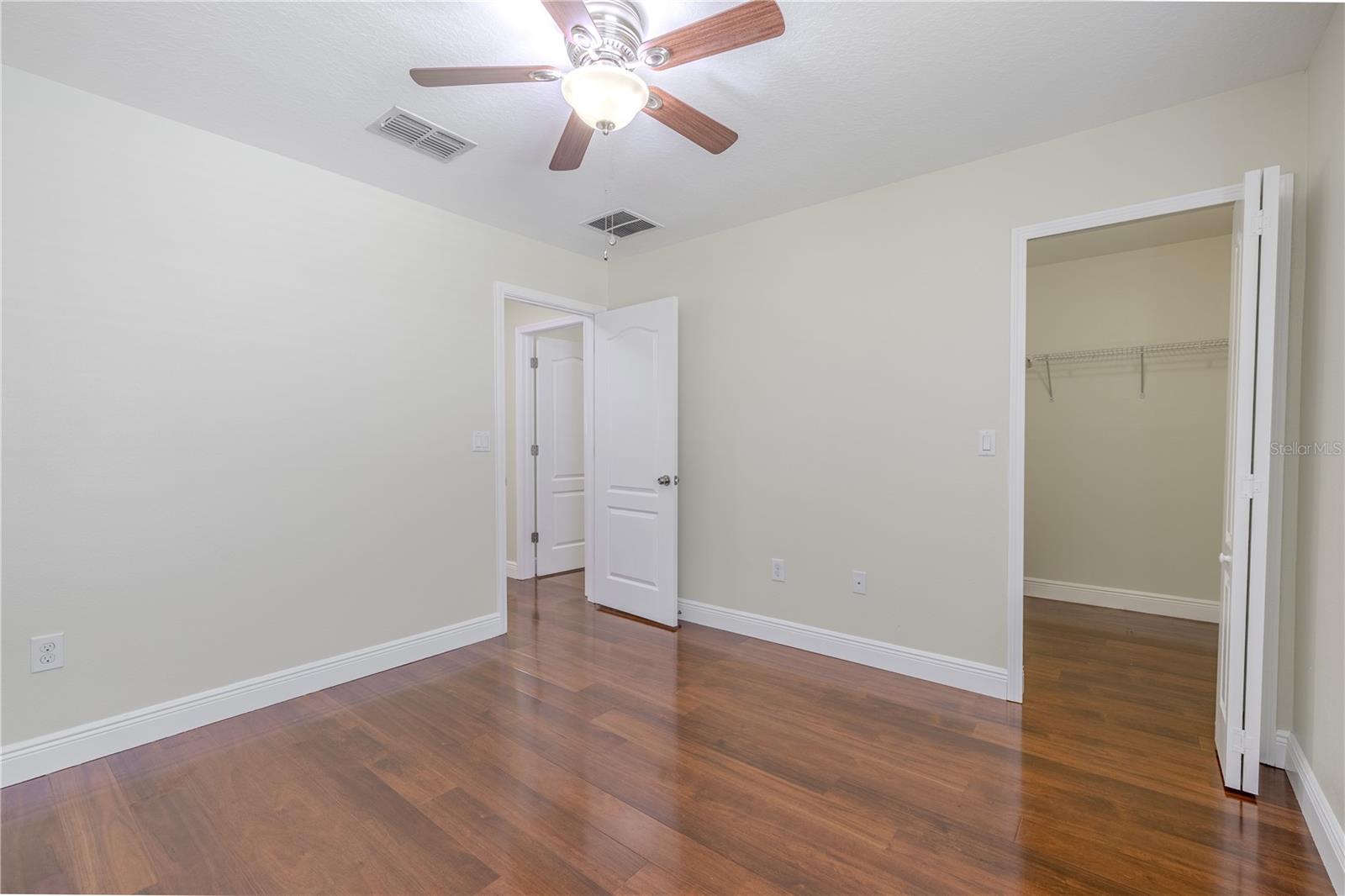 2nd bedroom features a walk-in closet