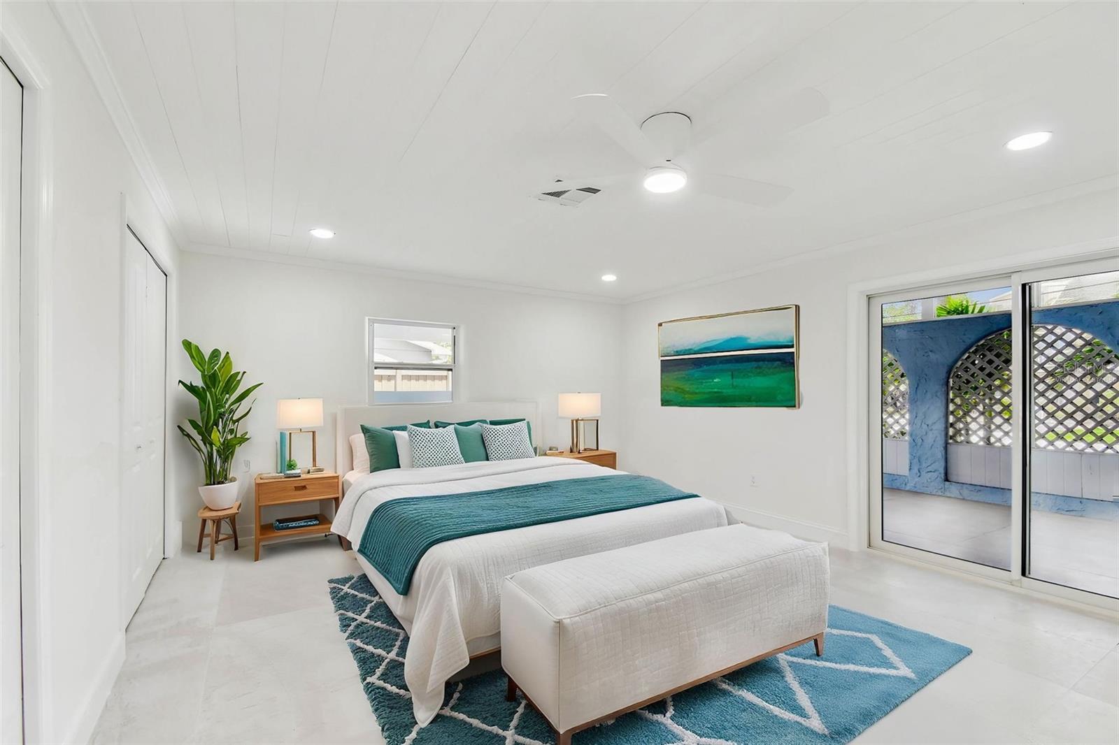 virtually staged 2nd bedroom with patio